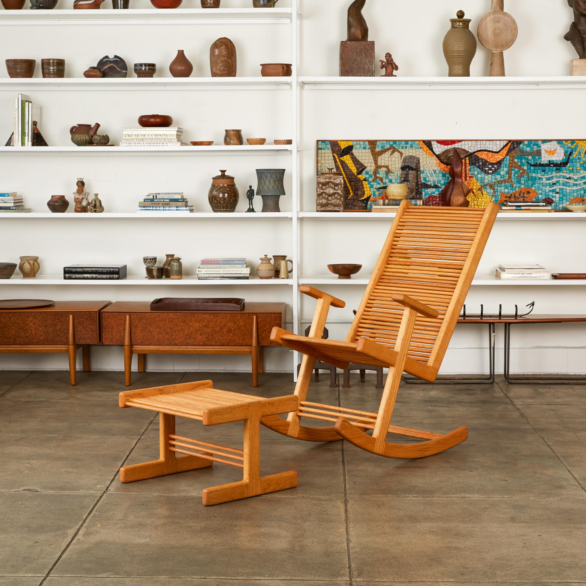 A 1980s Hawaiian studio craft rocking chair and ottoman by Stephen Hynson.  The chair and ottoman are made entirely of red oak, with a frame of rounded rails and a seat of closely spaced oak dowels with an ergonomic curve to the backrest.  Short arm