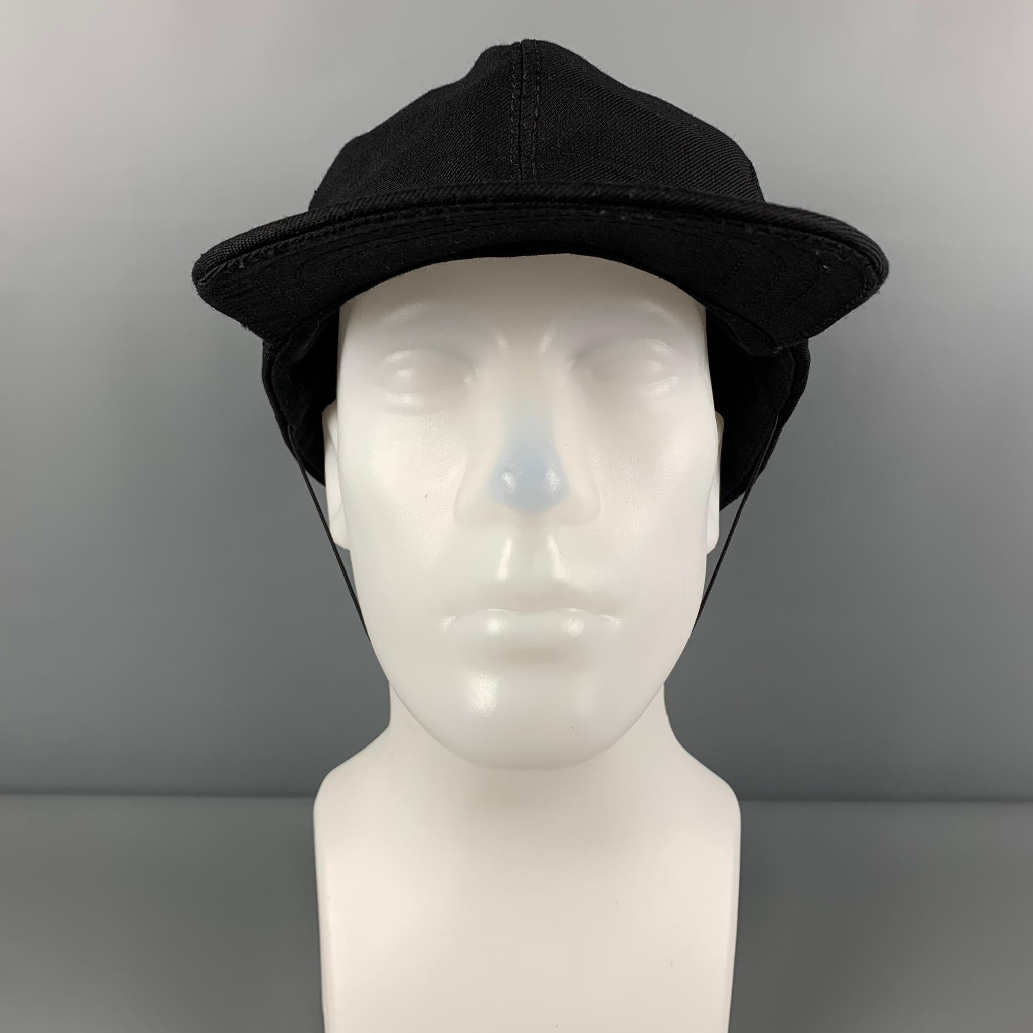 STEPHEN JONES for MARC JACOBS hat comes in a black wool featuring a baseball style, front brim, and a elastic strap. 

New with tags. 
Marked: M/L

Measurements:

Opening: 24 in.
Brim: 3.5 in.
Height: 7 in.