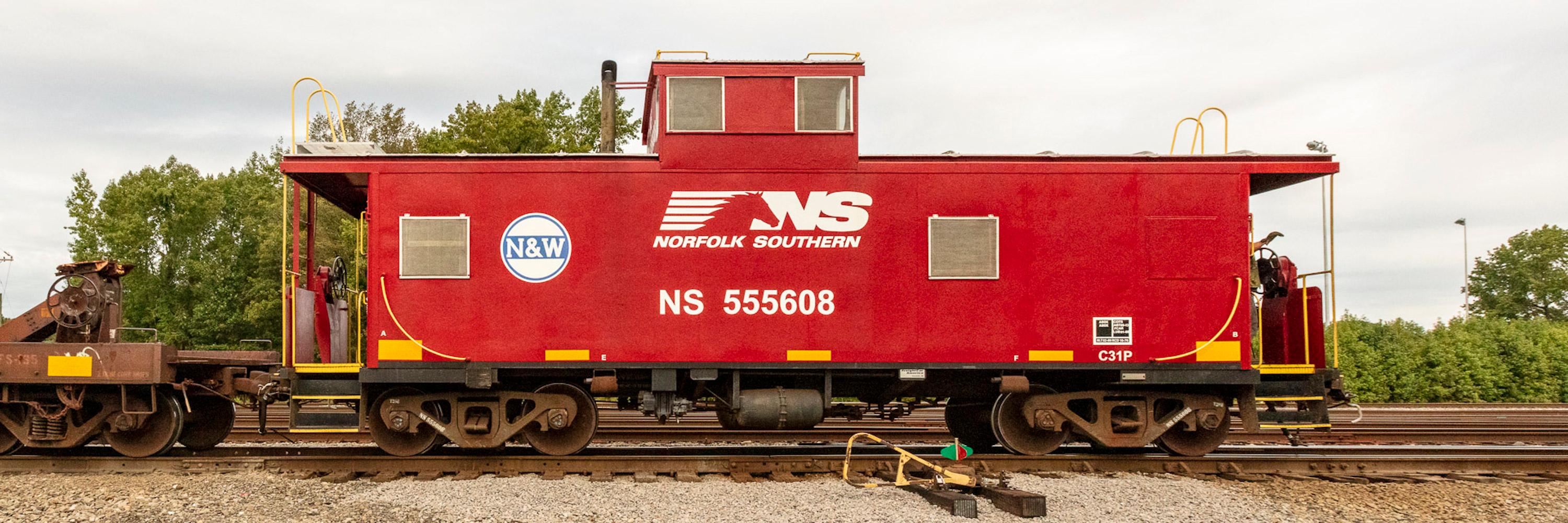 Stephen Mallon Landscape Photograph - Contemporary color photograph "NS 555608 Caboose" (freight train series)