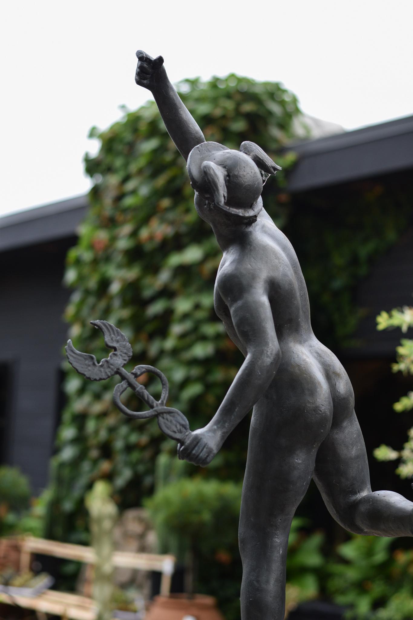 A modern take on a classic artform, Stephen Markham’s techniques transcends the time-honored craft of lead work into a contemporary landscape.
This classical figure features a stately interpretation of the Greek god Hermes, entirely cast in British