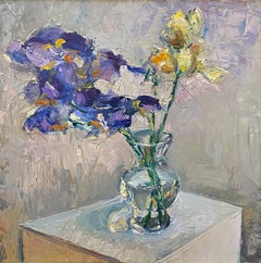 Iris en un jarrón de cristal