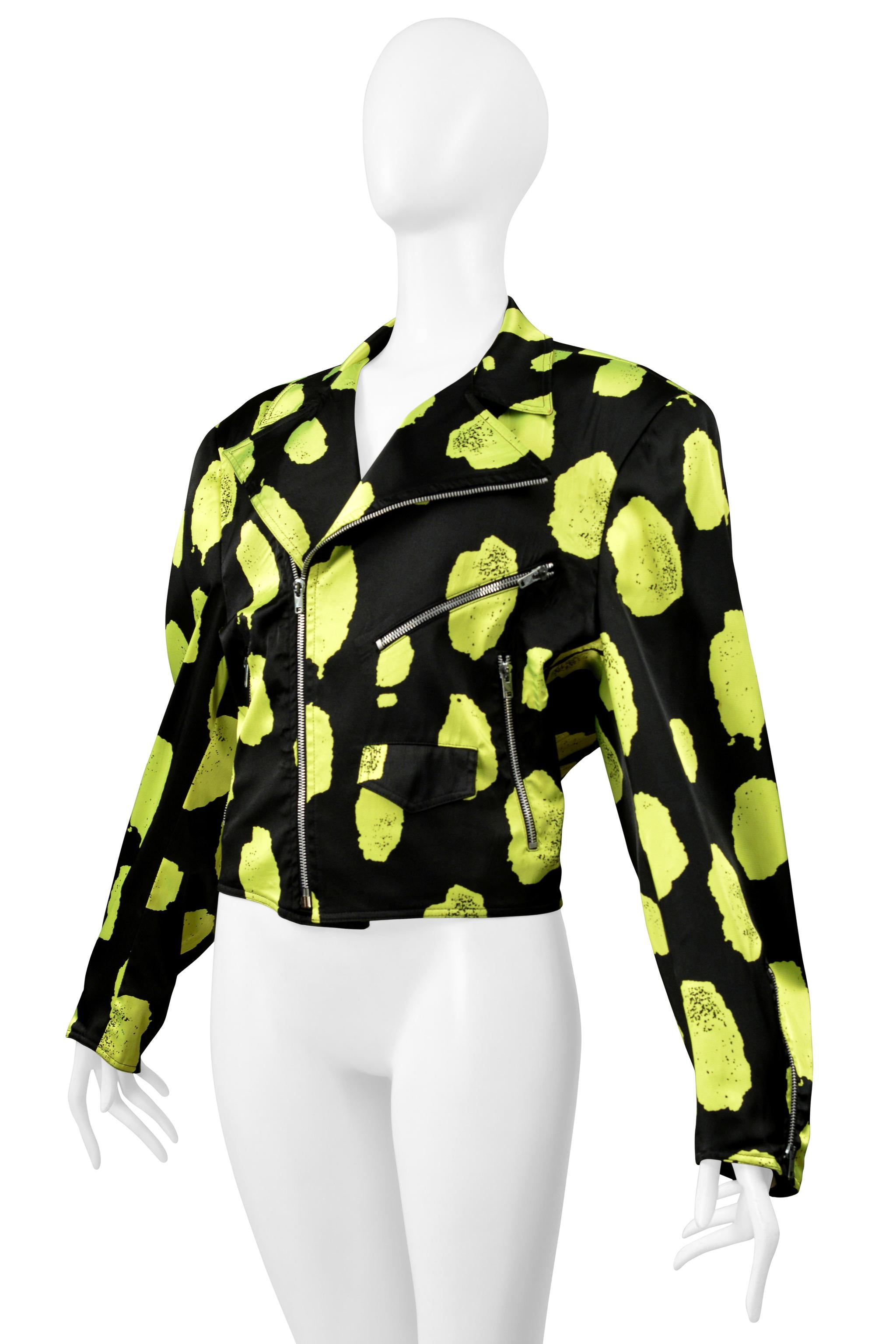 Resurrection Vintage is thrilled to offer this vintage black and neon green Stephen Sprouse satin motorcycle jacket. It features classic Moto lapels and zippers, oversized shoulders, a relaxed fit, and hip length. Sprouse black sequin brat top and