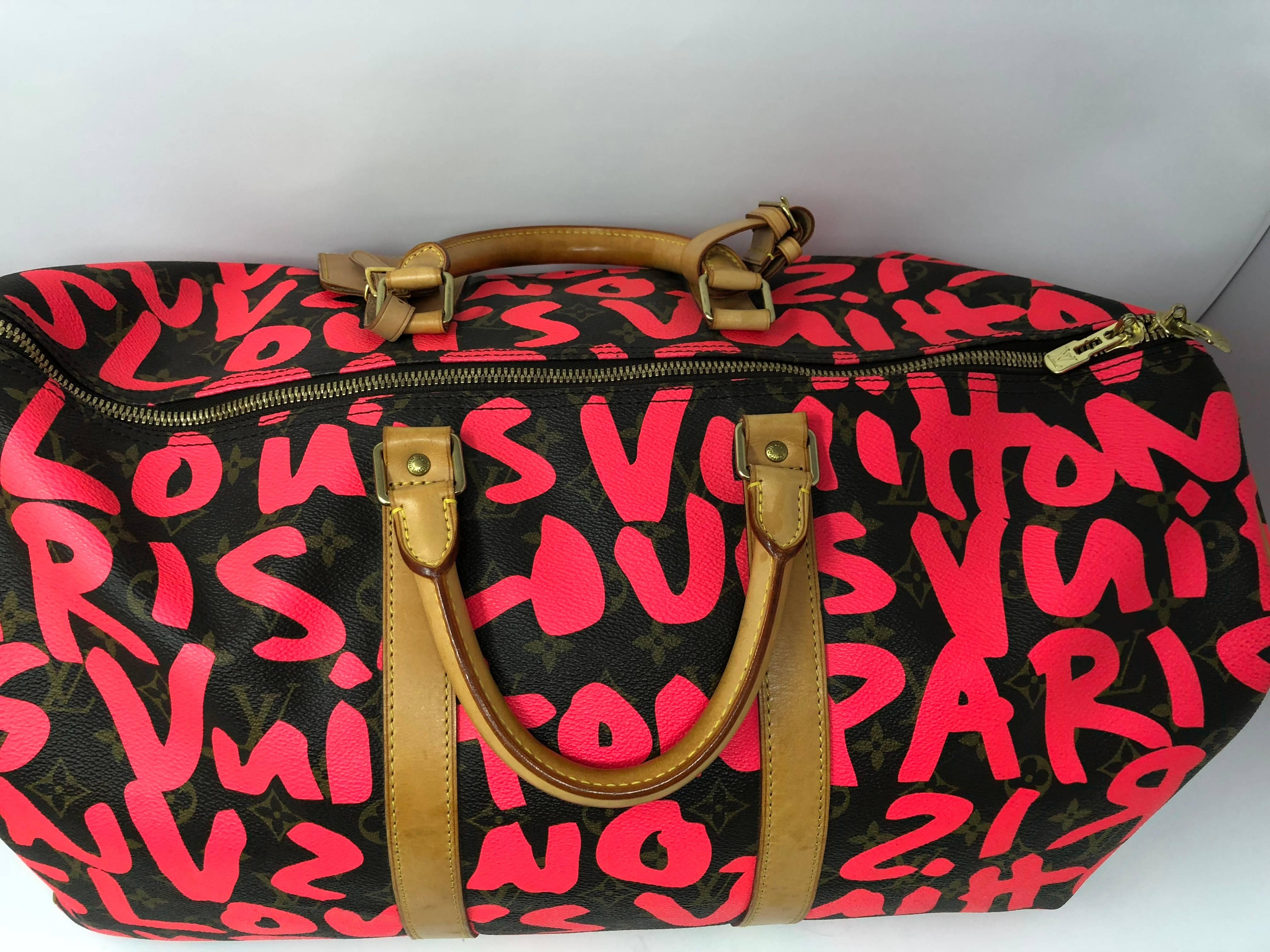 Louis Vuitton and Stephen Sprouse Collaboration called the Graffiti bag is a true collector's piece. Hot pink lettering over monogram coated canvas. Keepall 50 has some wear as seen in pictures. The leather has a nice honey patina. Interior is clean