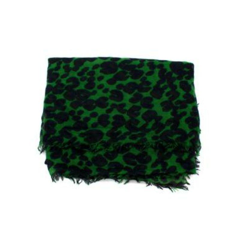 Louis Vuitton Leopard Print Cashmere/ Silk Green and Black Scarf
 
 
 
 - Light weight, fluid body 
 
 - Large pink Louis Vuitton logo print 
 
 - Green to navy gradient leopard print panels 
 
 - Light fringing around the edge
 
 
 
 Materials: 
 
