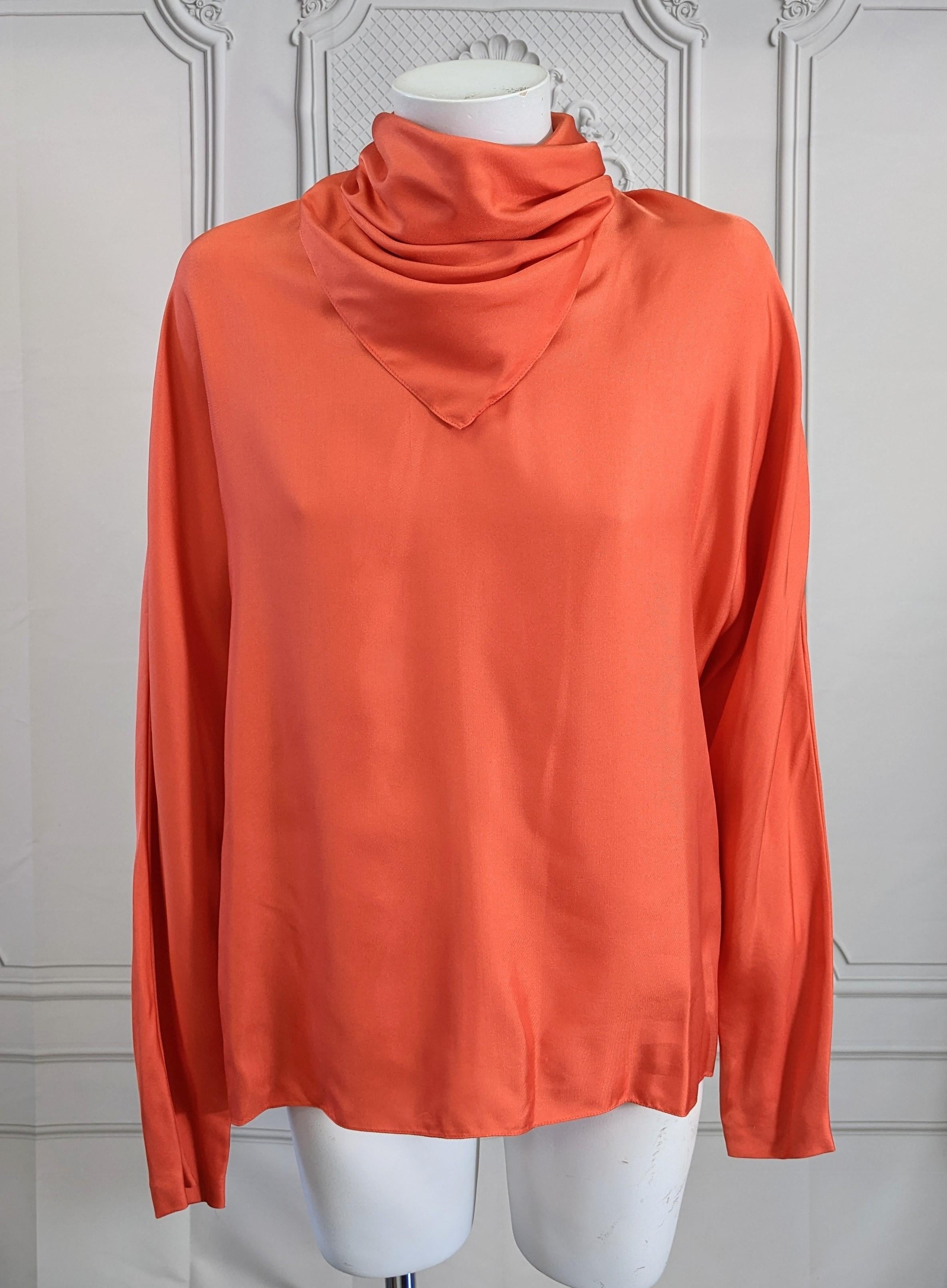 Stephen Sprouse Orange Silk Twill Blouse with attached scarf neckline made for one of his iconic monochromatic rocker suiting looks. Soft silk twill with high dolman cut sleeves and doubled draped scarf neckline which knots and buttons on the back.