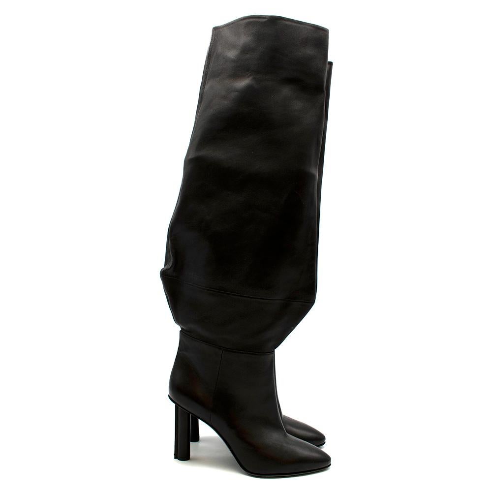 Stephen Venezia Black Leather Stiletto Knee Boots

- Soft leather knee length boots 
- Stiletto heel
- Slouch style boots 
- Slip on

Materials:
Main - 100% Calf Leather 

Made in Italy 

Heel height - 82mm
Boot height - 63cm
Sole width - 8.5cm
Sole