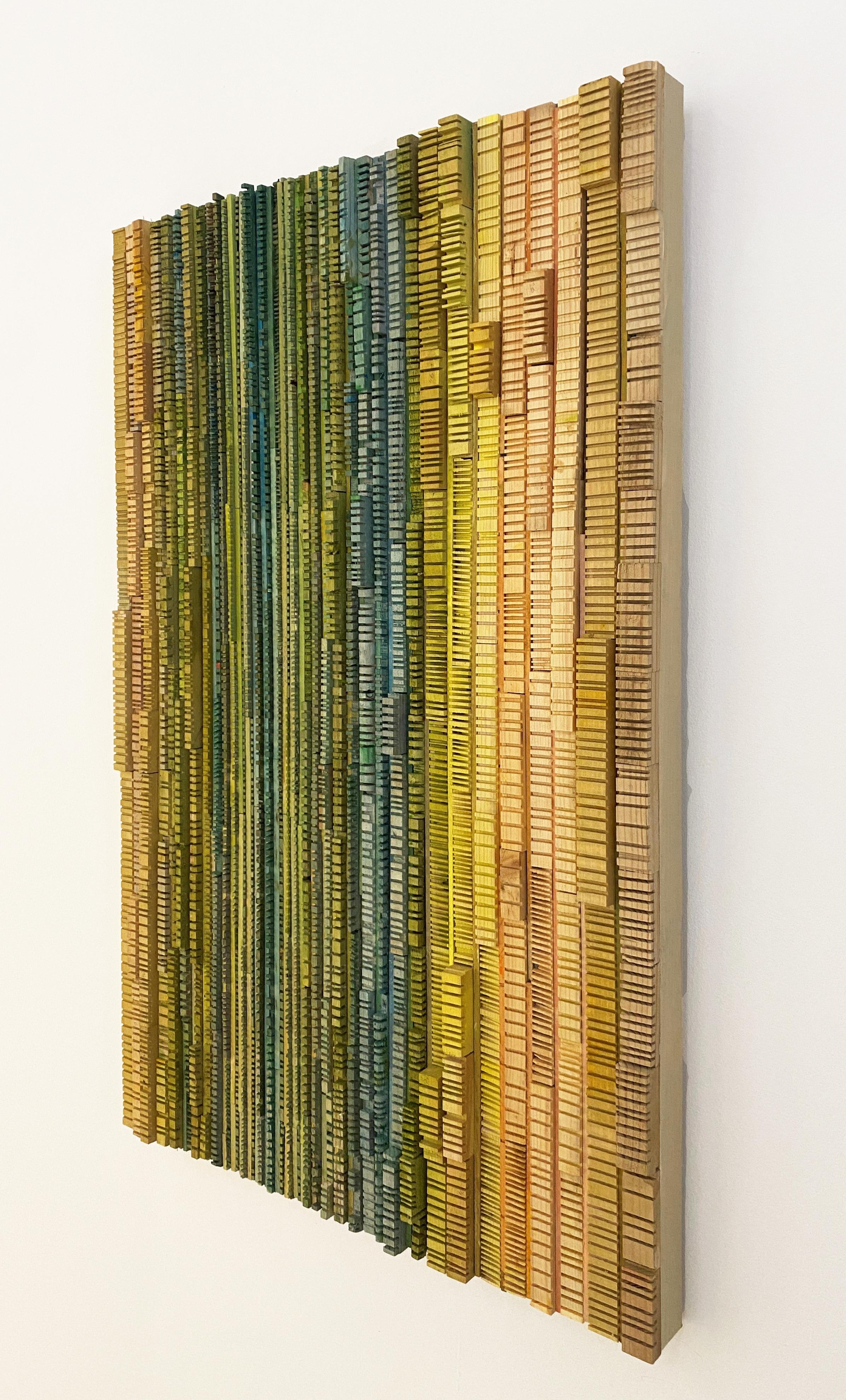 Abstract minimalist three-dimensional wood wall sculpture in blue, yellow and green.  
