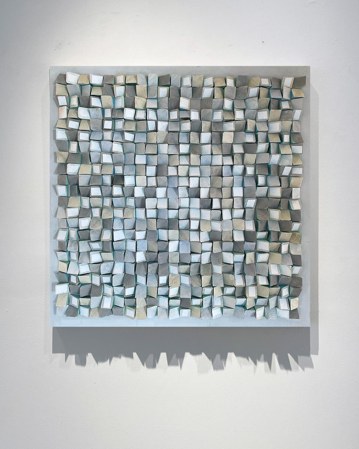Abstract Geometric wood three-dimensional wall sculpture in light blue, white, and light grey
Painted wood and collaged paper on panel
36 x 36 x 2.5 inches
Hangs flush to the wall with hanging wire
Signed on verso
Clean, painted wood edges so