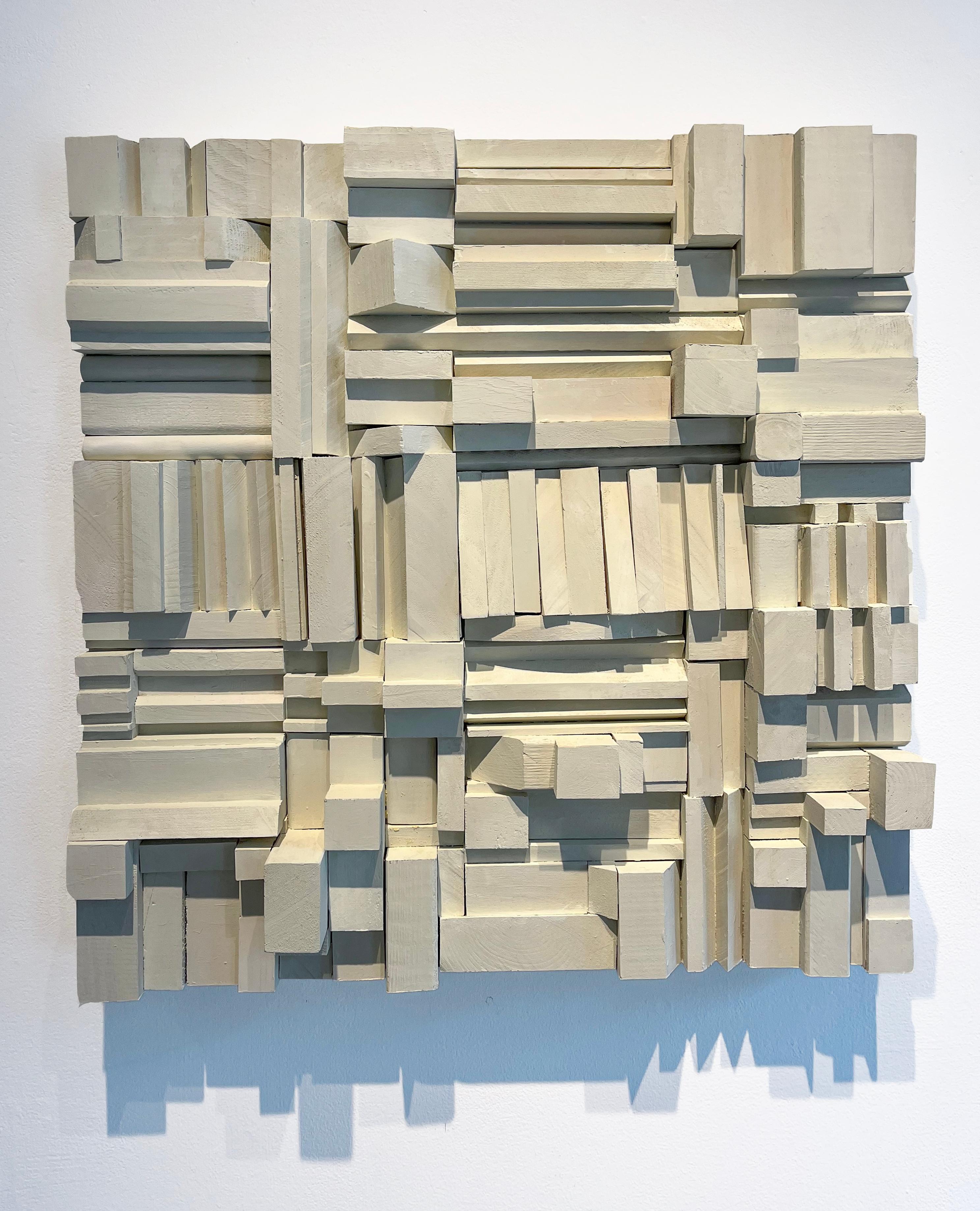 Abstract, minimalist three-dimensional wood wall sculpture in a soft off-white
