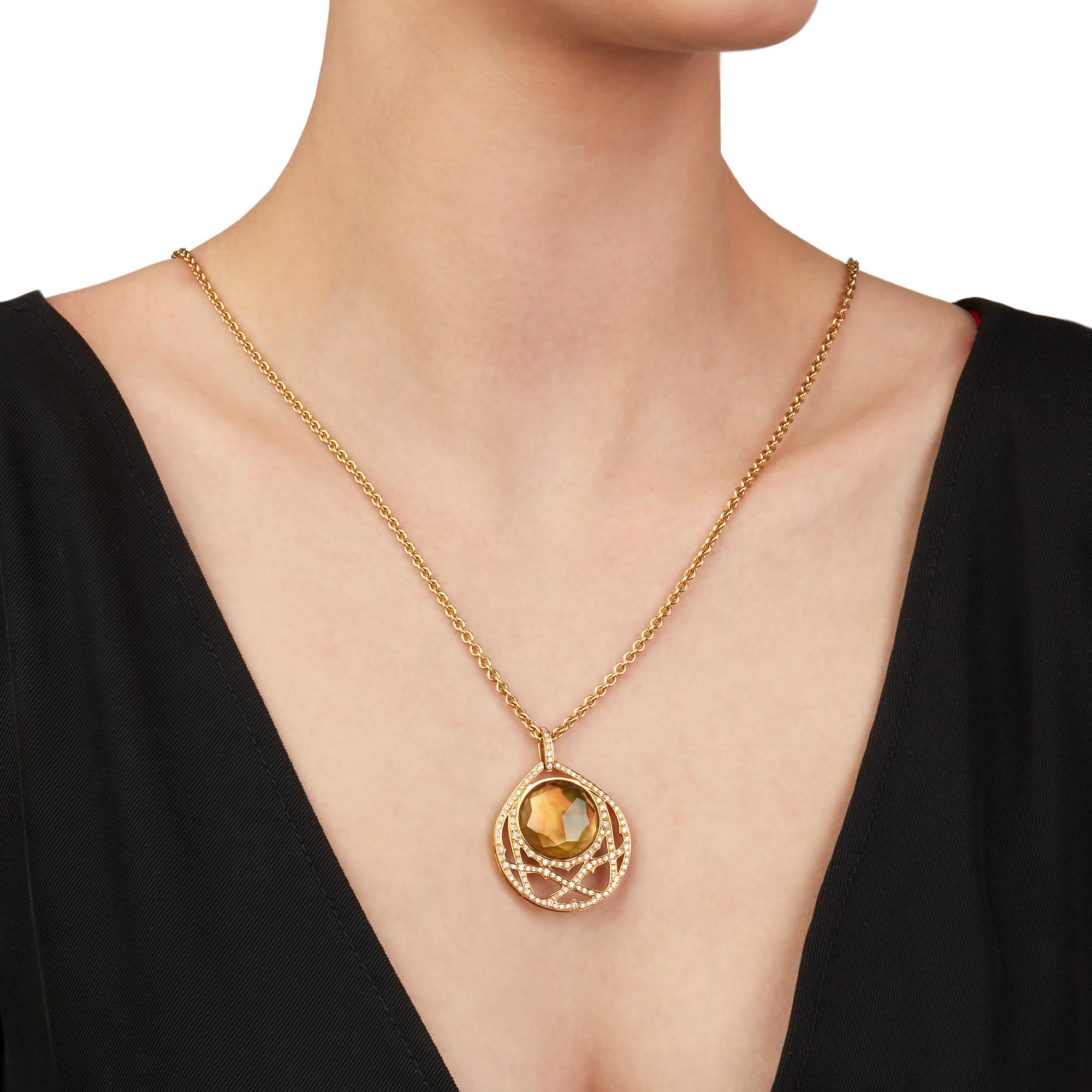 This Necklace by Stephen Webster is from their Crystal Haze collection and features a Citrine doublet with Mother of Pearl surrounded by round brilliant cut Diamonds, made in 18k Yellow Gold. This Necklace has a secure lobster clasp. Complete with