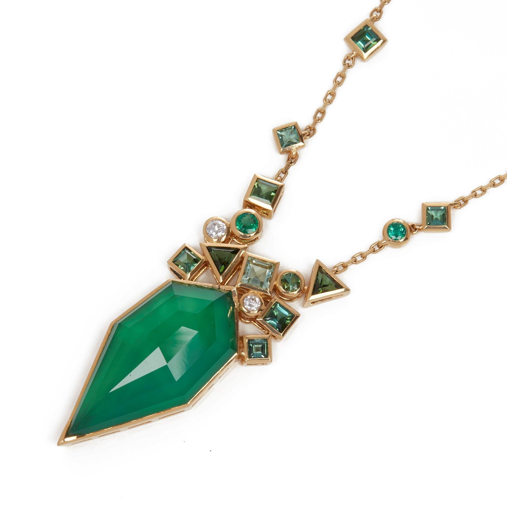 This Pendant by Stephen Webster is from his Crystal Haze Gold Struck Collection and features a Green Agate surrounded by mixed cut Green Tourmaline and Round Brilliant Cut Diamonds. With 76cm Trace Chain. Set in 18k Yellow Gold.