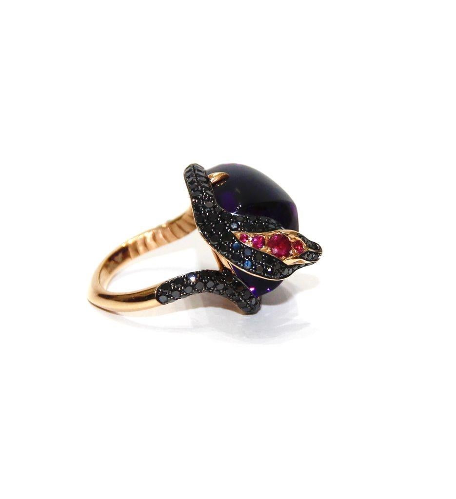 Stephen Webster 18K Gold Snake Ring
18K White Gold
Black Diamonds 1.72ctw
Ruby 0.31ctw
Amethyst 18.5ct
 Retail $ 9,900.00
