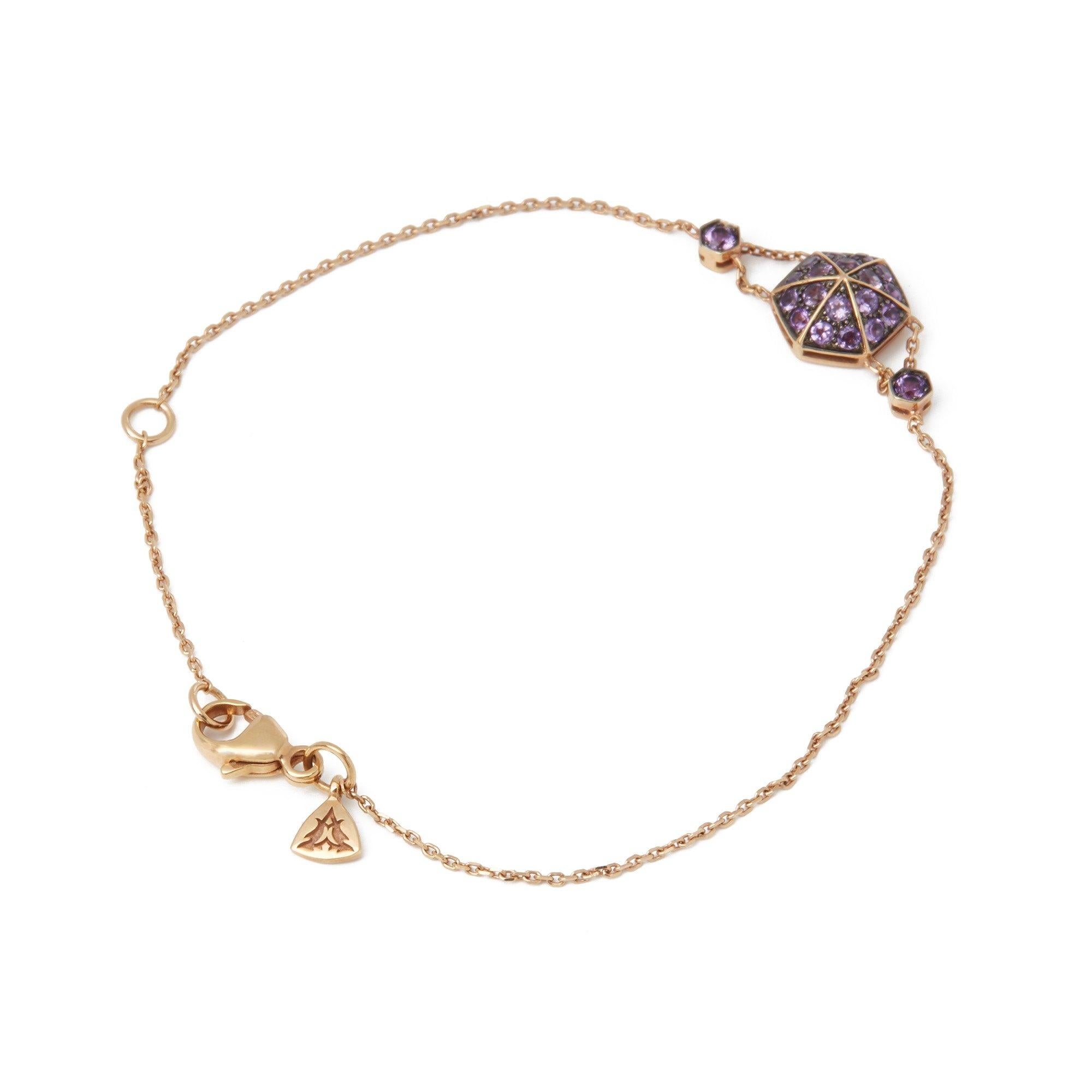 This Bracelet by Stephen Webster is from his Deco Collection and features Six Pave Round Amethyst set sections with a total of Twenty stones forming a Hexagonal shape. Set in 18k Rose Gold with 17cm Trace Link Chain. Complete with Xupes Presentation