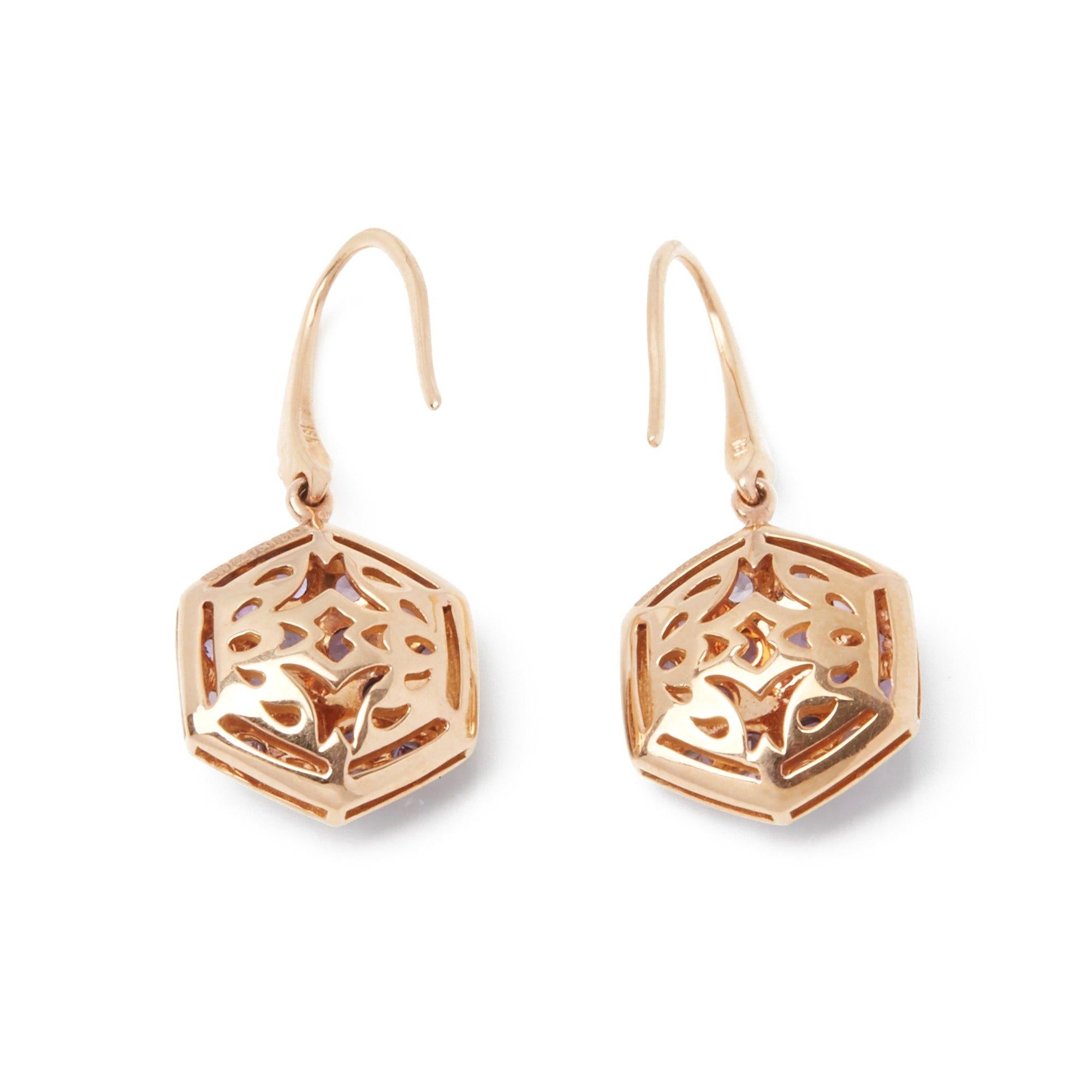 These Earrings by Stephen Webster are from his Deco Collection and features Two, Six Pave Round Amethyst set sections with a total of Thirty Eight stones forming a Hexagonal shape. Set in 18k Rose Gold with Articulated Leverback Earclips. 