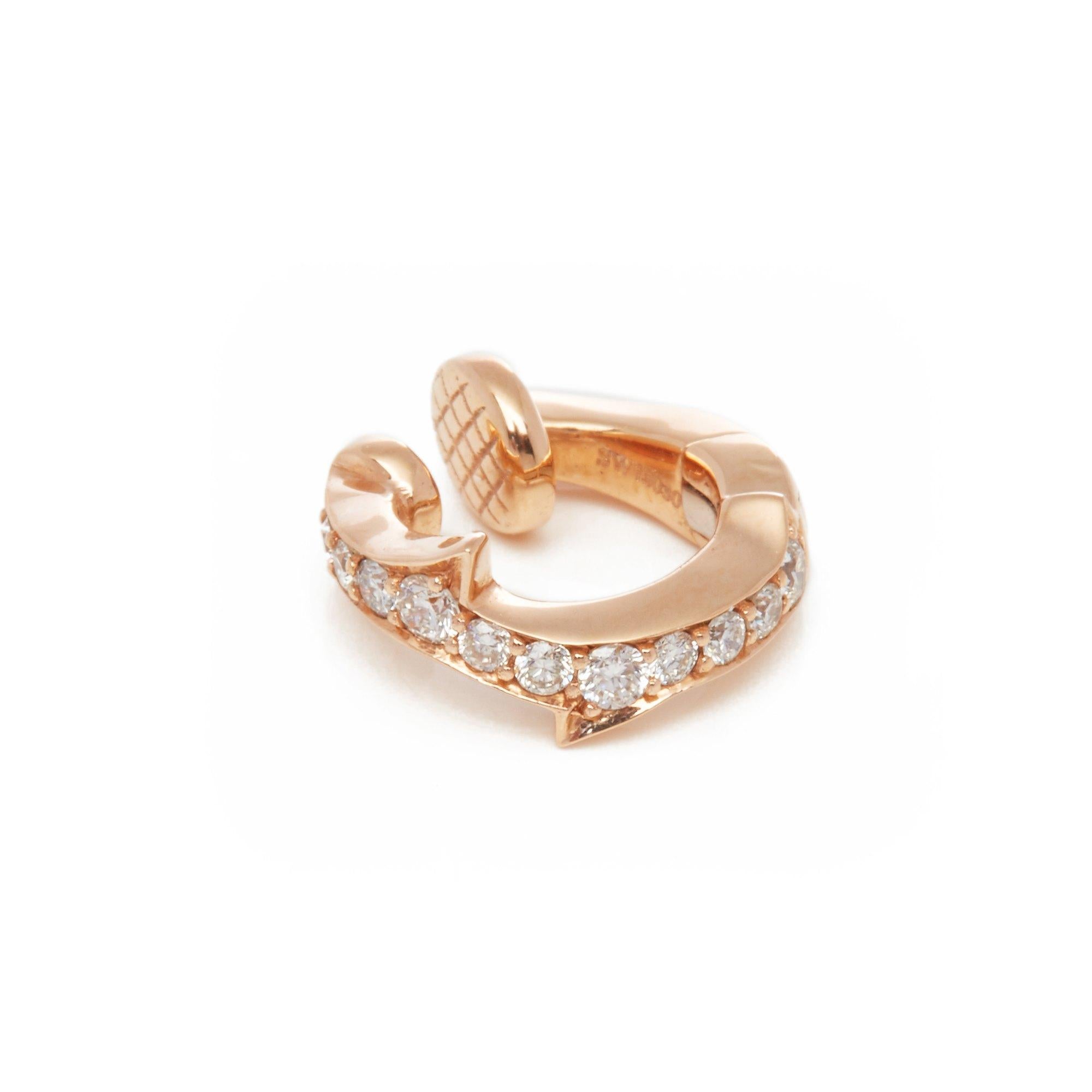 This Earclip by Stephen Webster is from his Thorn Collection and features Twelve Round Brilliant Diamonds Totalling 0.12cts. Set in 18k Rose Gold. Complete with Xupes Presentation Box. Our Xupes reference is COMJ441 should you need to quote this.