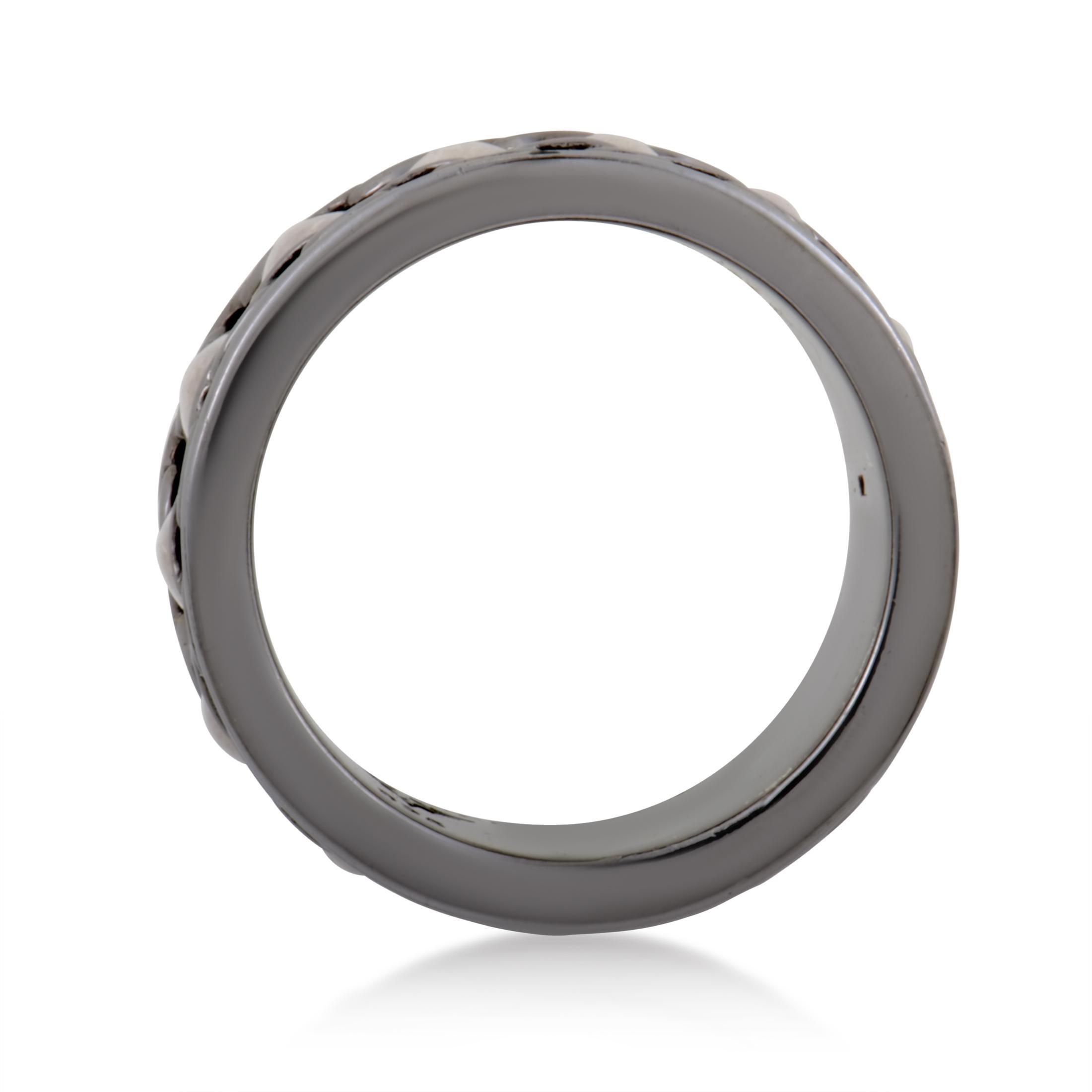 An extremely daring and bold idea executed in exquisitely stylish fashion, this incredibly amazing men's band ring from Stephen Webster perfectly embodies the prestigious brand's timeless values and immensely enriches the stunning 'Alchemy in the