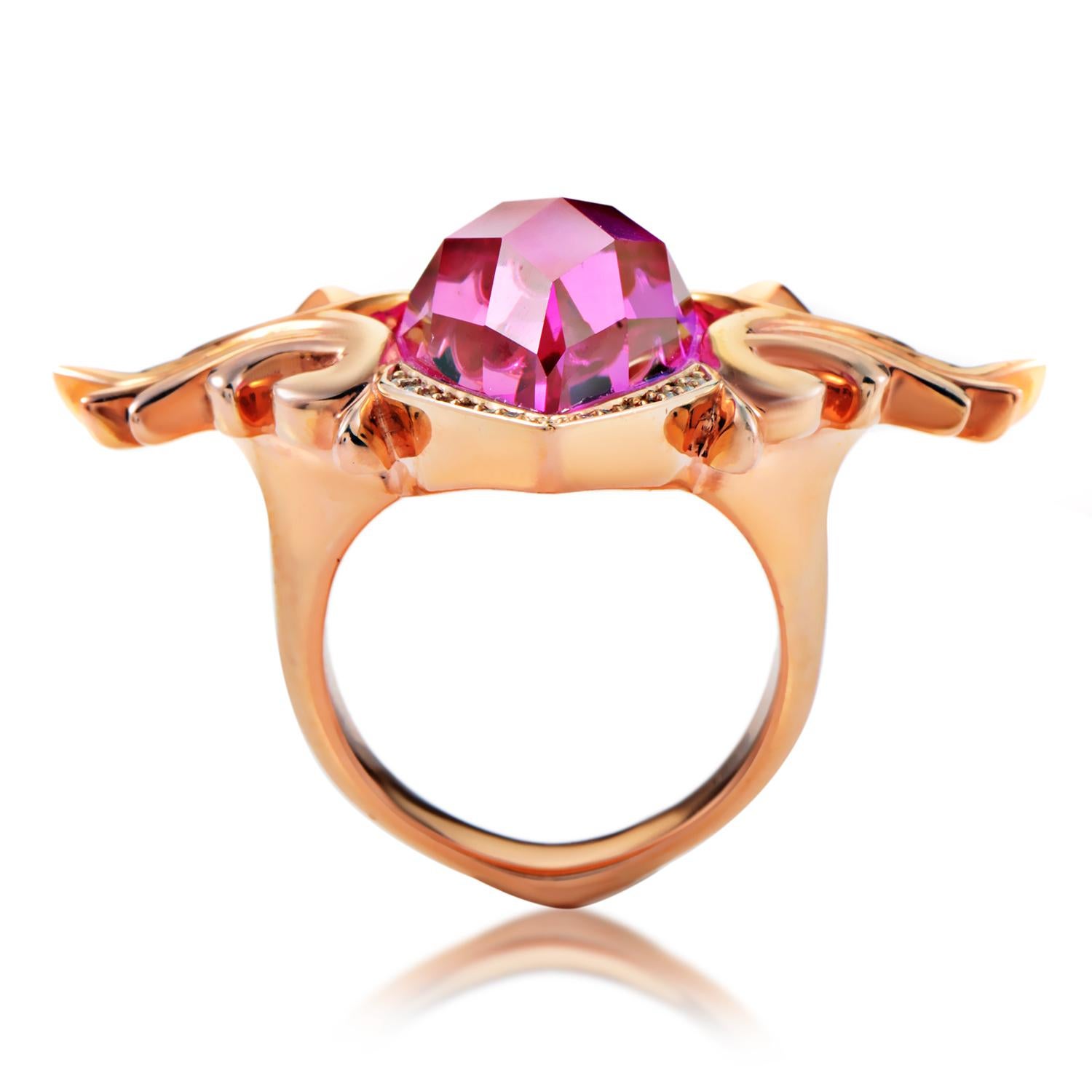 Awe-inspiring and splendidly feminine, this gorgeous ring boasts an endearingly intricate design that compels with its offbeat elements and harmonious overall tone. The ring is made of rose gold-plated sterling silver that sets the lovely tone for