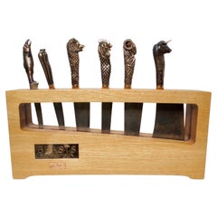 Coltelli da chef We the Beast di Stephen Webster con manici in bronzo e lame in acciaio di Damasco