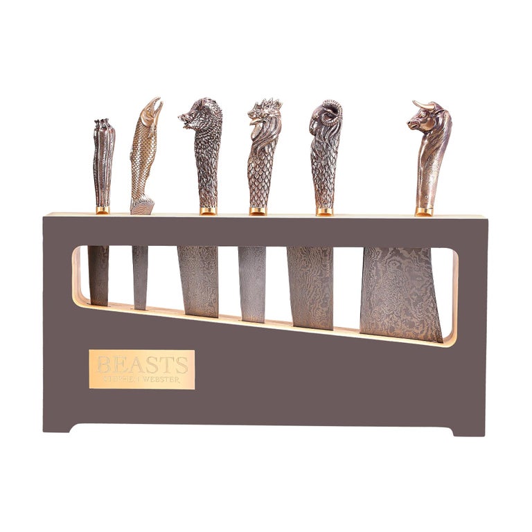 Beasts chef's knives with folded steel blades and bronze handles