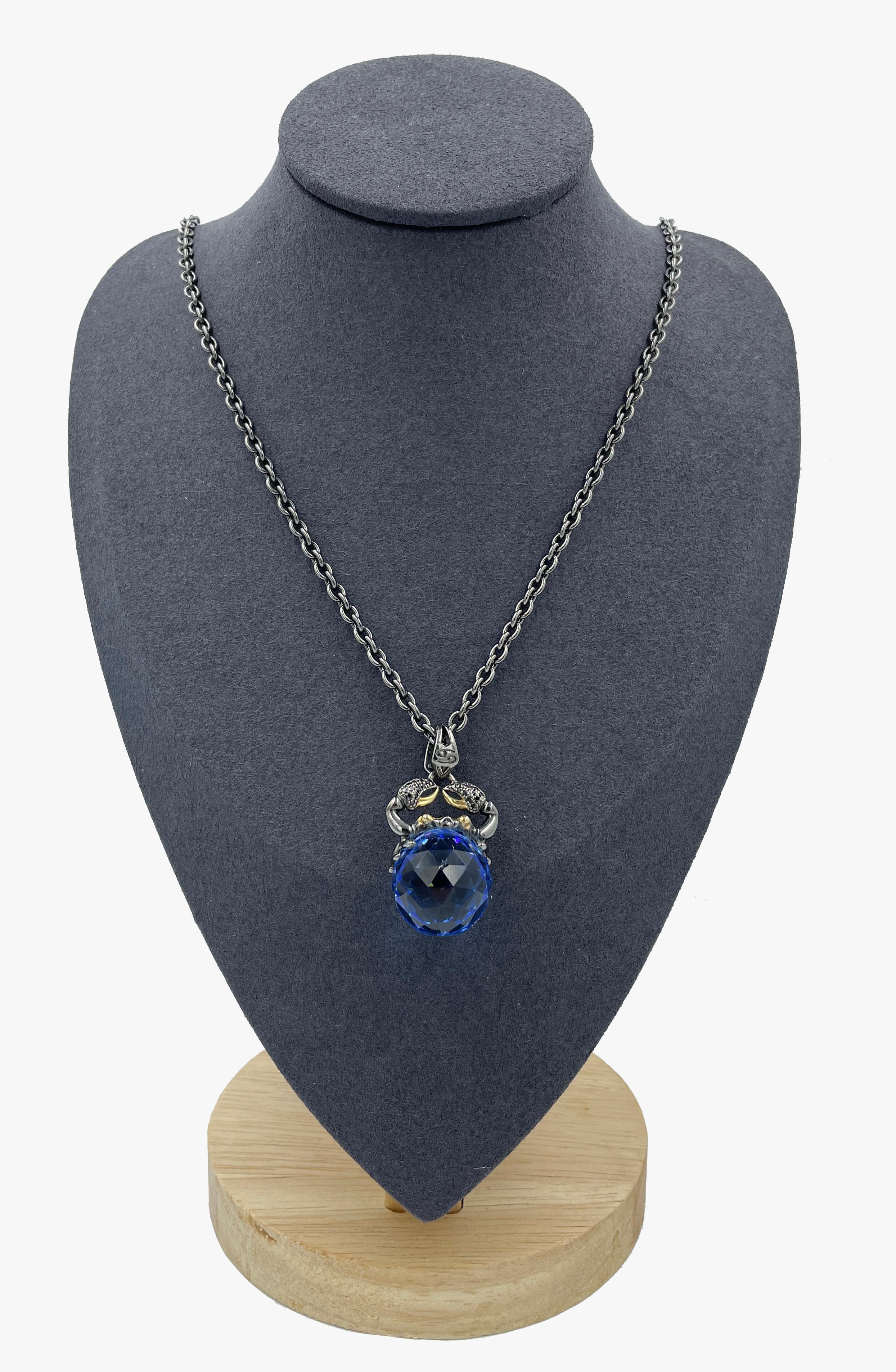Stephen Webster blue glass pendant from Zodiac collection featuring Cancer sign. 

Chain made of  925 silver. 

Total length – 43 cm / 17”

Сhain length – 38,5 cm / 15”

Signed.

Condition: Very good. A chip on the glass ball.

........Additional