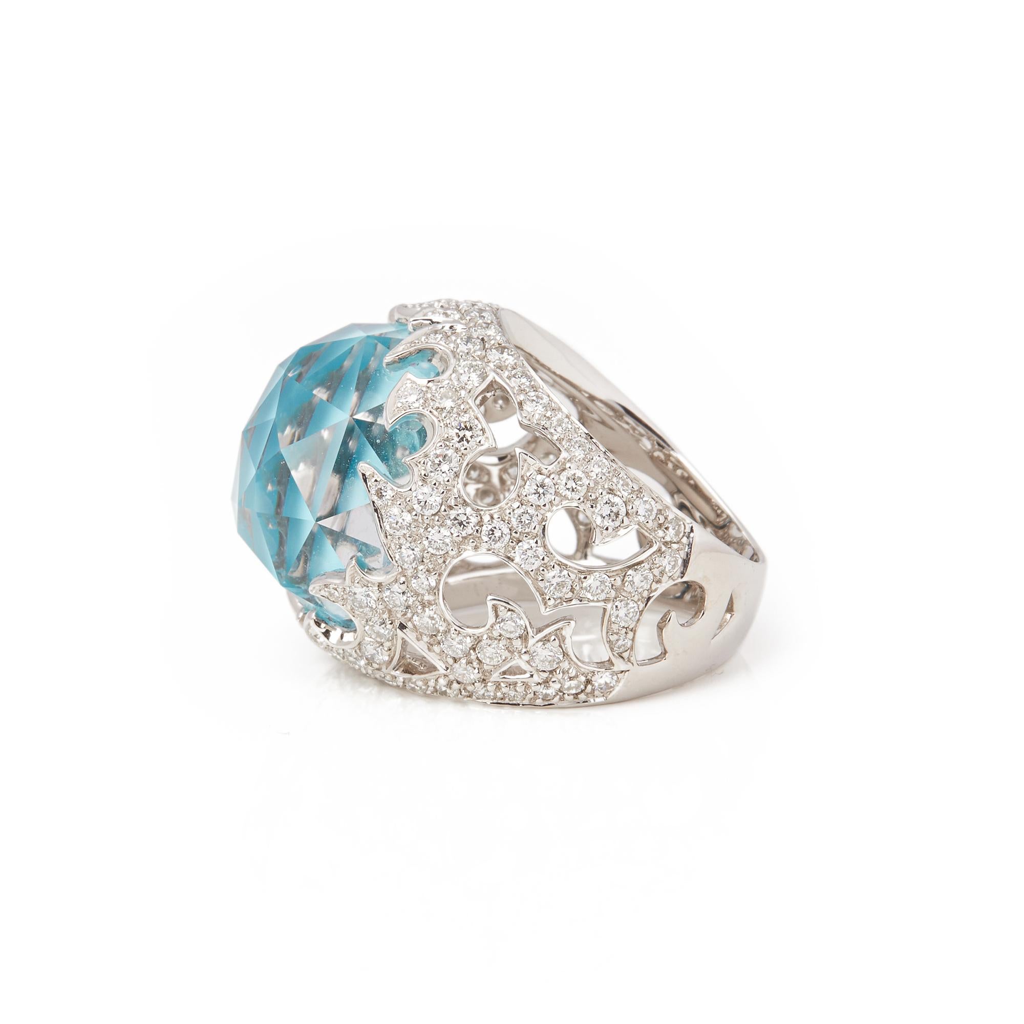 This ring by Stephen Webster is from his Borneo Lipstick collection and features a turquoise and quartz Crystal Haze stone surrounded by pave set white diamonds. Set in white gold with signature band. Ring Size N 1/2. Complete with Xupes