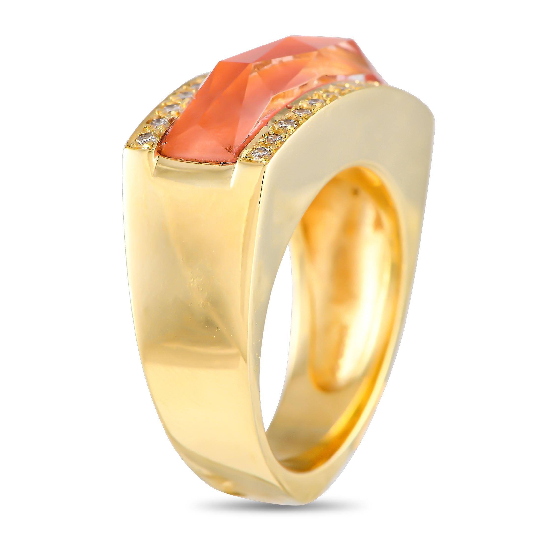 Icy white diamonds and a stunning crystal haze coral come together to create a stunning contrast that's both bold and delicate. This contemporary statement ring from Stephen Webster is rendered in 18K yellow gold and has a coral inlay bordered by