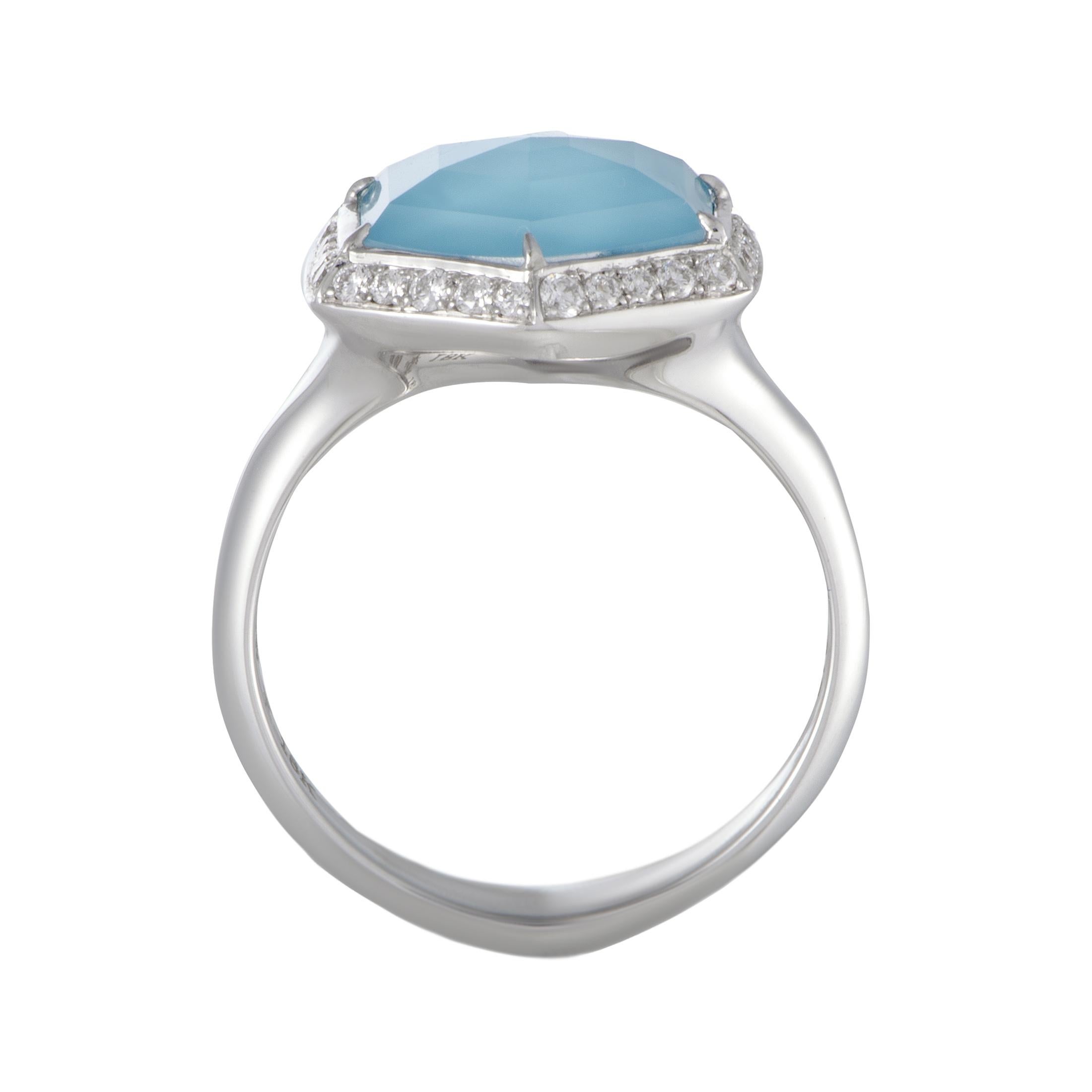 Spotlessly polished and embellished with tantalizingly bright gemstones, this spectacular ring offers a look of absolute prestige and elegance. The ring is designed by Stephen Webster, and splendidly crafted from luxurious 18K white gold. This