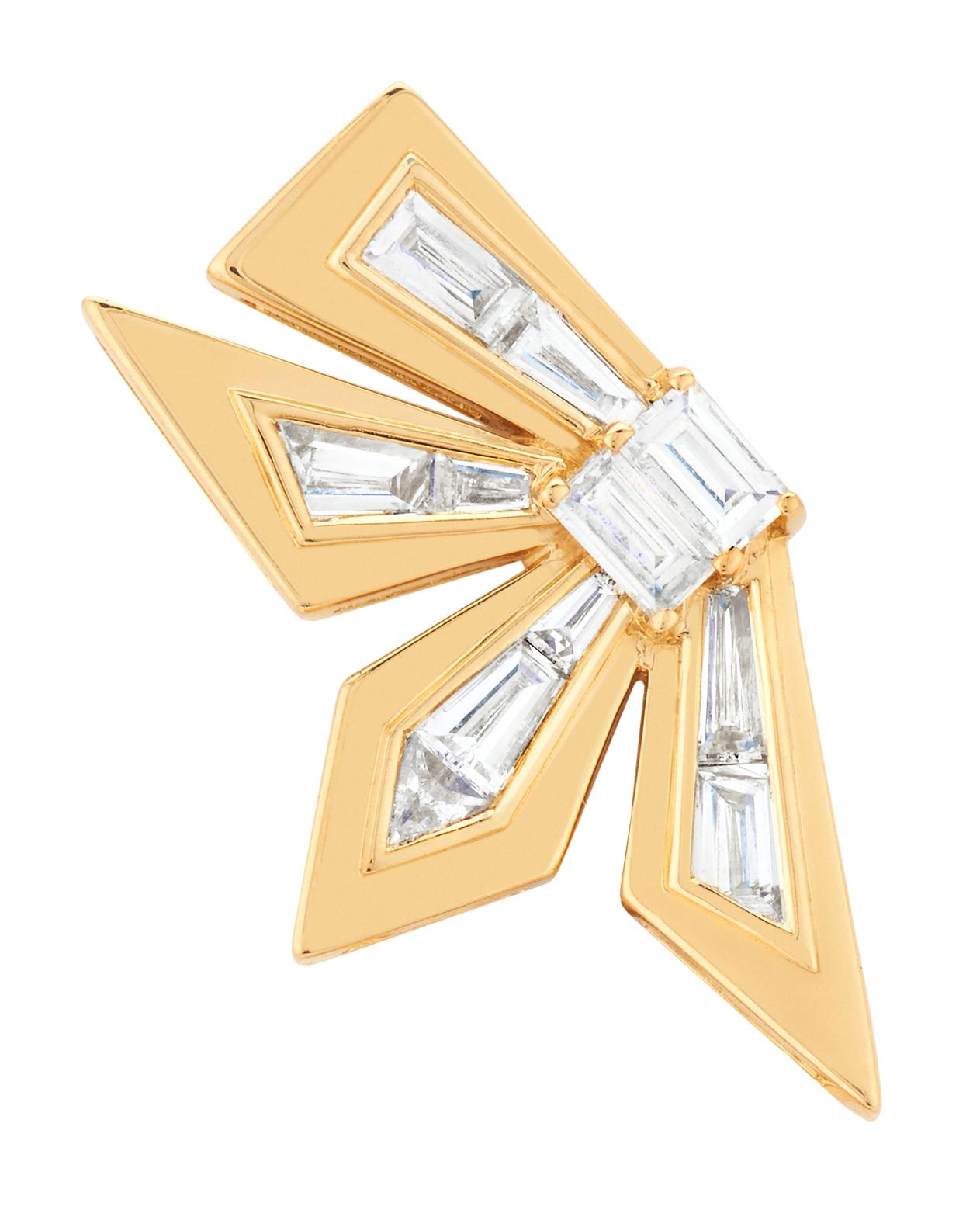 Taking inspiration from fragments of post-modern architecture, Stephen Webster presents the Dynamite Cascade Earrings set in 18 karat yellow gold, with tapered baguette and trilliant cut white diamonds (1.08 carats).

Please enquire for your