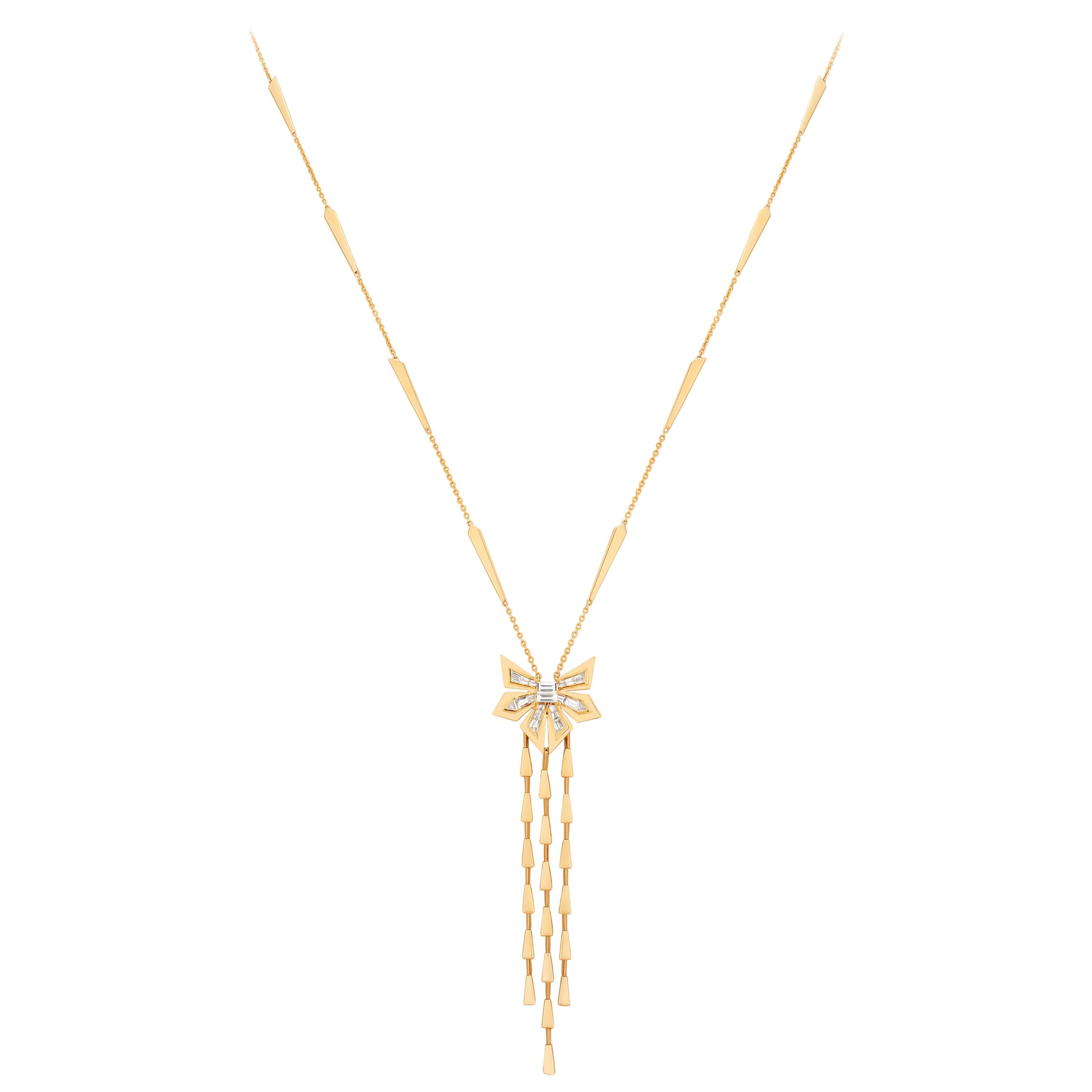 Captivating the asymmetrical forms of post-modernism architecture, Stephen Webster introduces the Dynamite Cascade Necklace. Set in 18 karat yellow gold, with tapered white diamond baguettes and central white diamond baguettes (0.80 carats).

Please