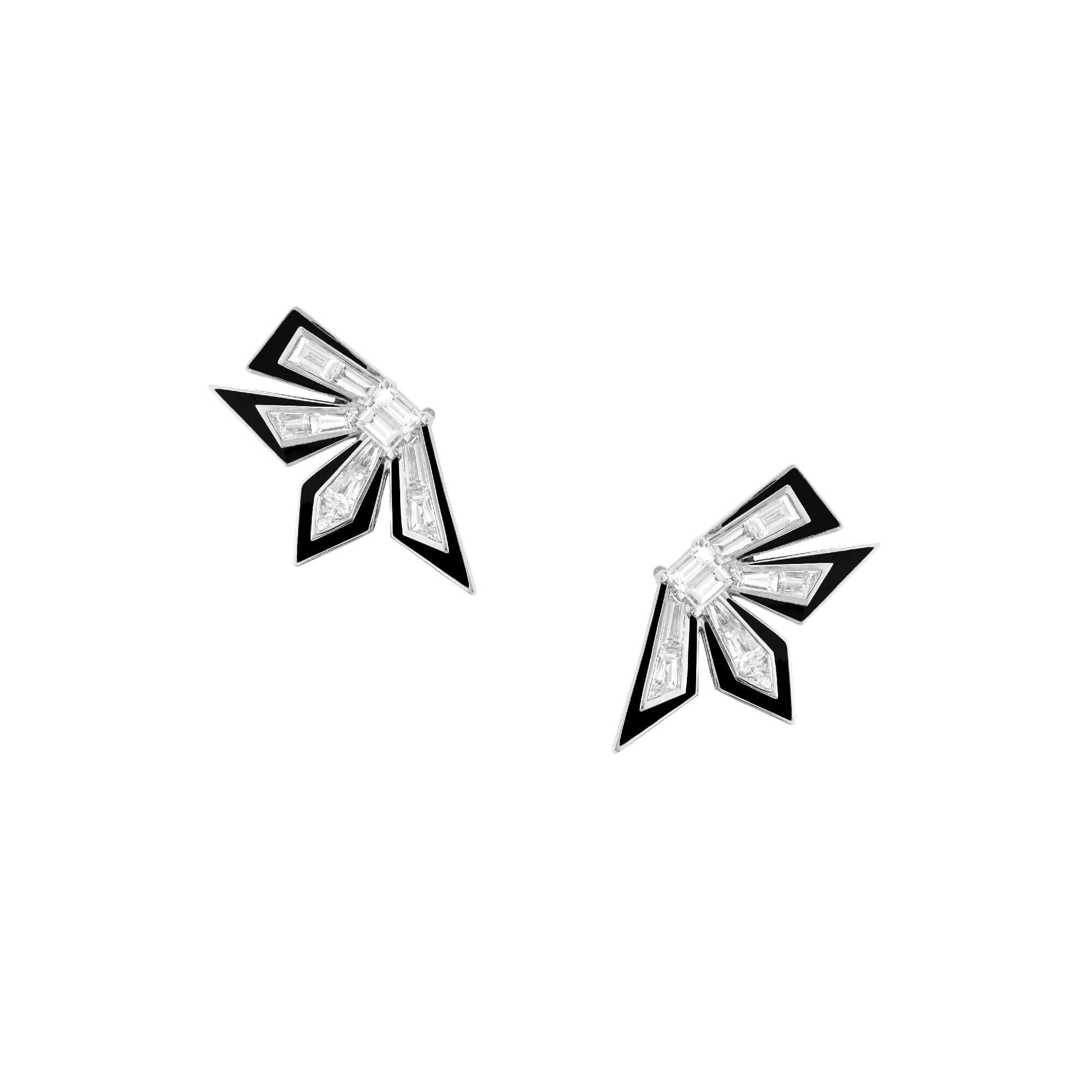 Inspired by the aftermath of the Big Bang theory, Stephen Webster presents the Dynamite Cascade Earrings set in 18 karat white gold, tapered baguette and trilliant cut white diamonds (2.07 carats), tapered baguette cut black spinels (7.80 carats),