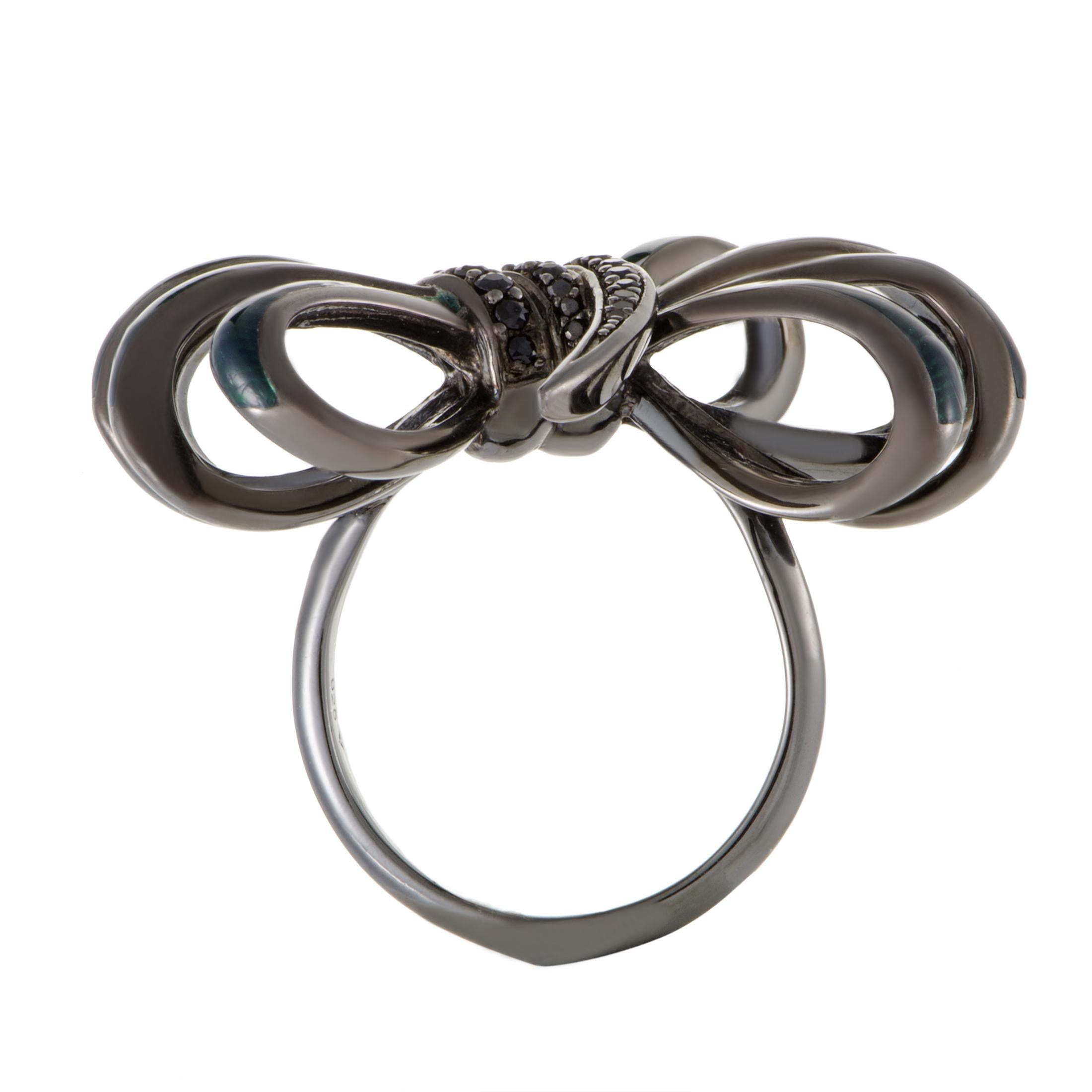 Astonishing harmony, captivating artistic shapes and exquisitely splendid craftsmanship meet in this remarkable ring from Stephen Webster's 'Forget Me Knot' collection which is beautifully made of radiant black rhodium-plated silver with stunning