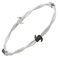 Stephen Webster Forget Me Knot Silber Diamant und schwarzer Saphir Armspange Armband