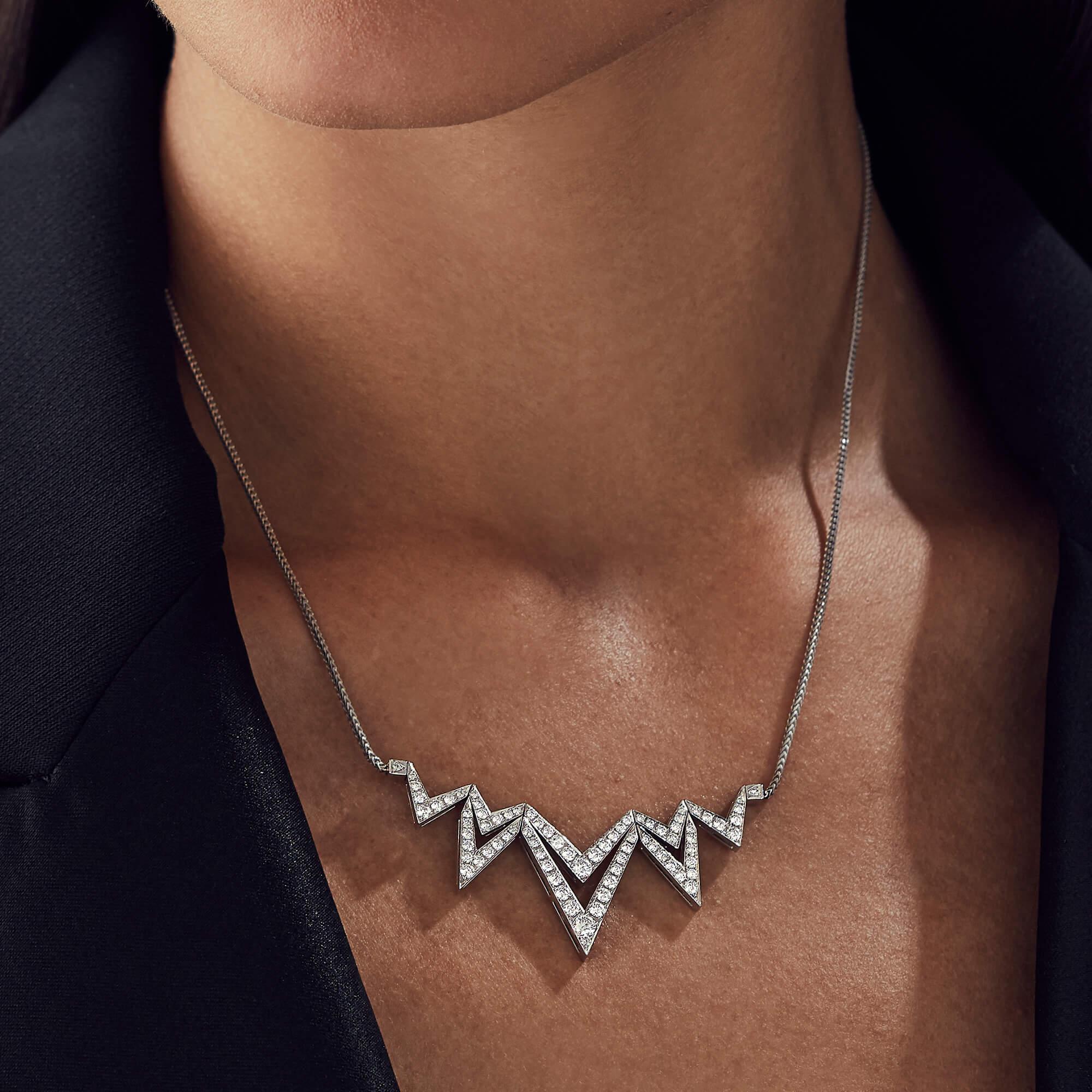 Woven with the fearless, bold v-shaped pattern, the 'Lady Stardust' necklace is handcrafted in 18ct white gold and accentuated with white diamond pavé (1.53cts).

Please enquire for your exclusive price if your delivery country is outside of the