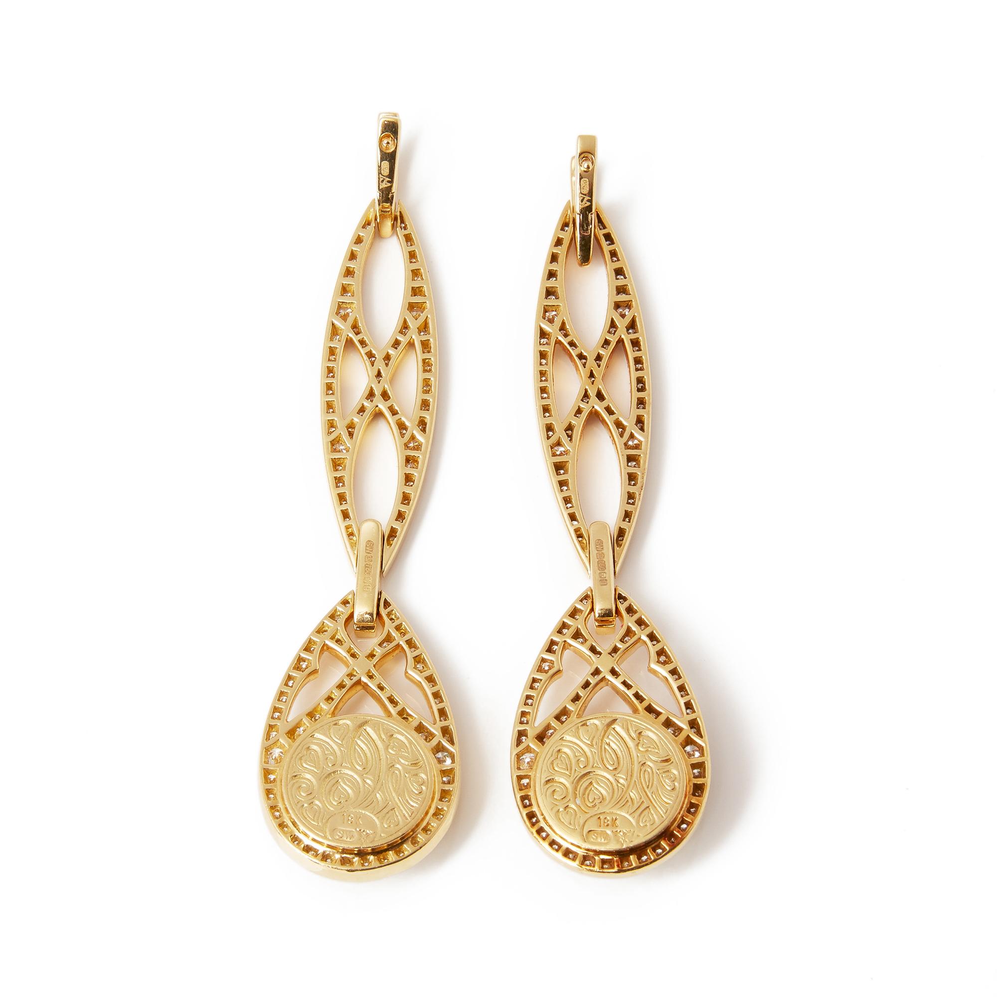 These earrings by Stephen Webster are from his Love Haze collection and feature two opalescent quartz Crystal Haze stones accentuated by pave set white diamonds. Set in yellow gold and with a post fitting and detachable element. 

Yellow Gold