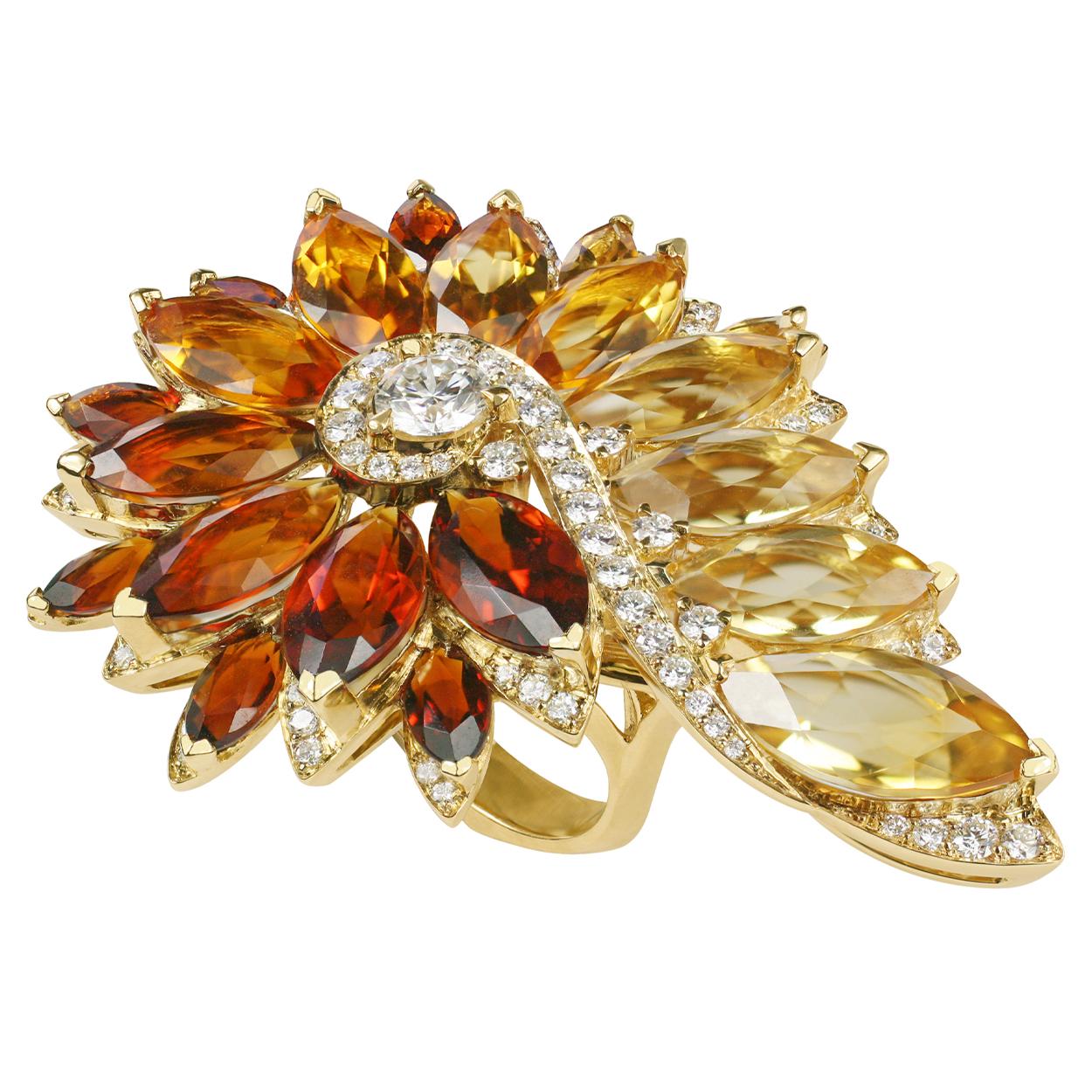 Magnipheasant Feathers Cocktail Ring set in 18ct yellow Gold with white Diamond pavé (0.62ct), a single white Diamond centre stone (0.31ct), and solid Citrine (12.19ct).

Available in US ring size 7.

Built on a foundation of 40 years of technical