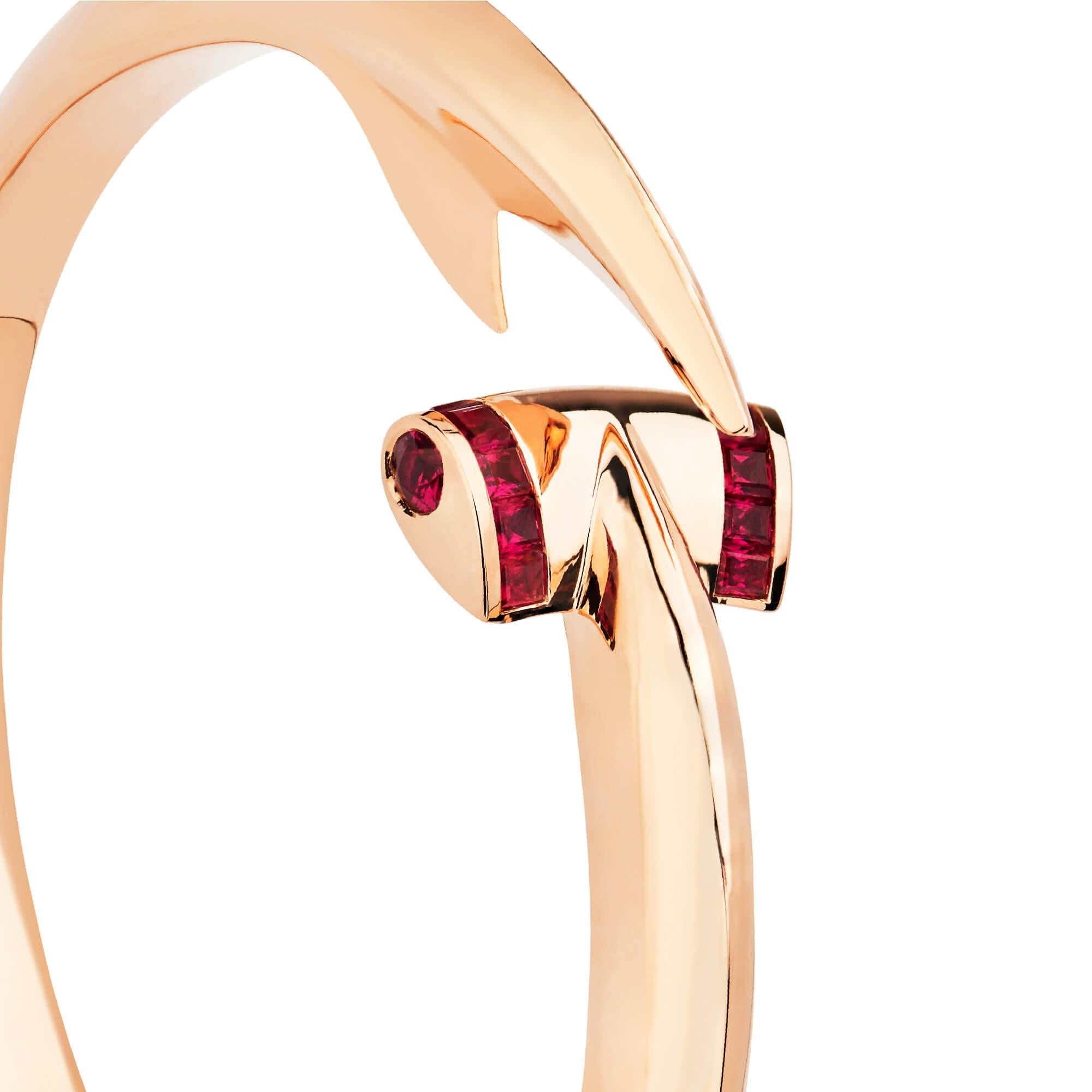 Inspired by the hammerhead shark and its ever-changing ocean home, this 18 karat rose gold statement cuff is a tribute to the wonderful creatures brought to life by Jules Verne in ‘Twenty Thousand Leagues Under the Sea’.

Hand crafted in 18ct rose