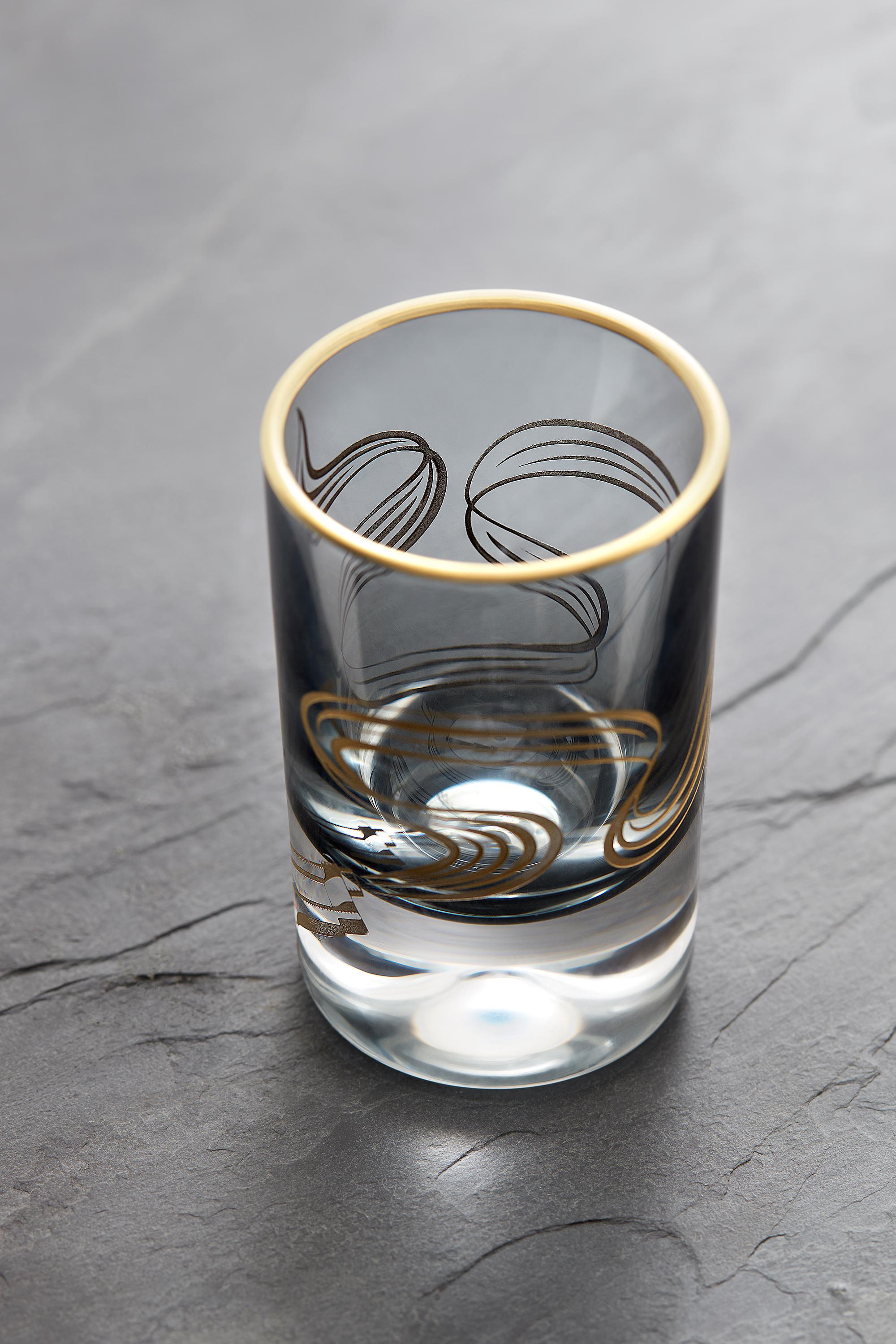 'Russian Roulette' is a set of intricate and expressive bar accessories inspired by the cupolas of Moscow's Saint Basil's Cathedral.

A range of crystal glassware etched and gold engraved with Webster's smoking gun motif, handcrafted in the UK. Each