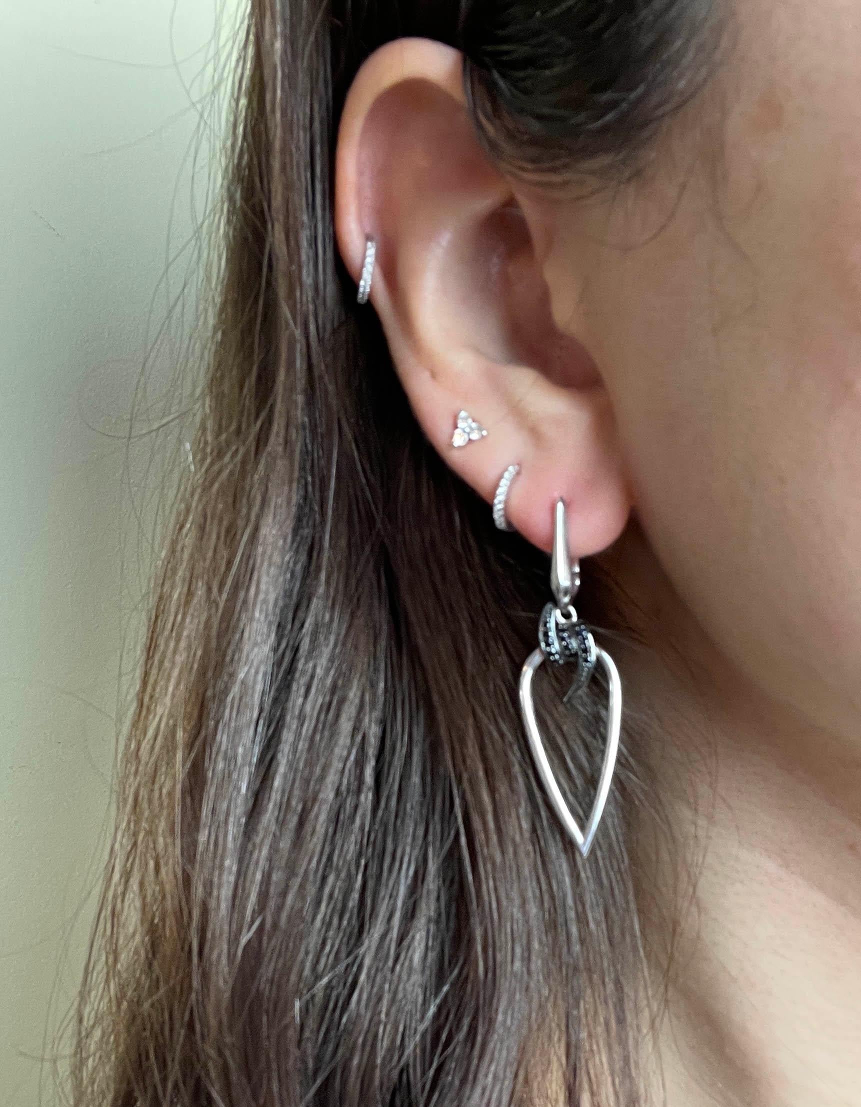 Stephen Webster Sterling Silver & Black Sapphire Barb Wire Drop Pierced Earrings

Materials: Sterling silver and black sapphire
Hallmarks: 925, designer hallmark
Closure/Opening: Pierced
Overall Condition: Excellent 
Includes: Stephen Webster
