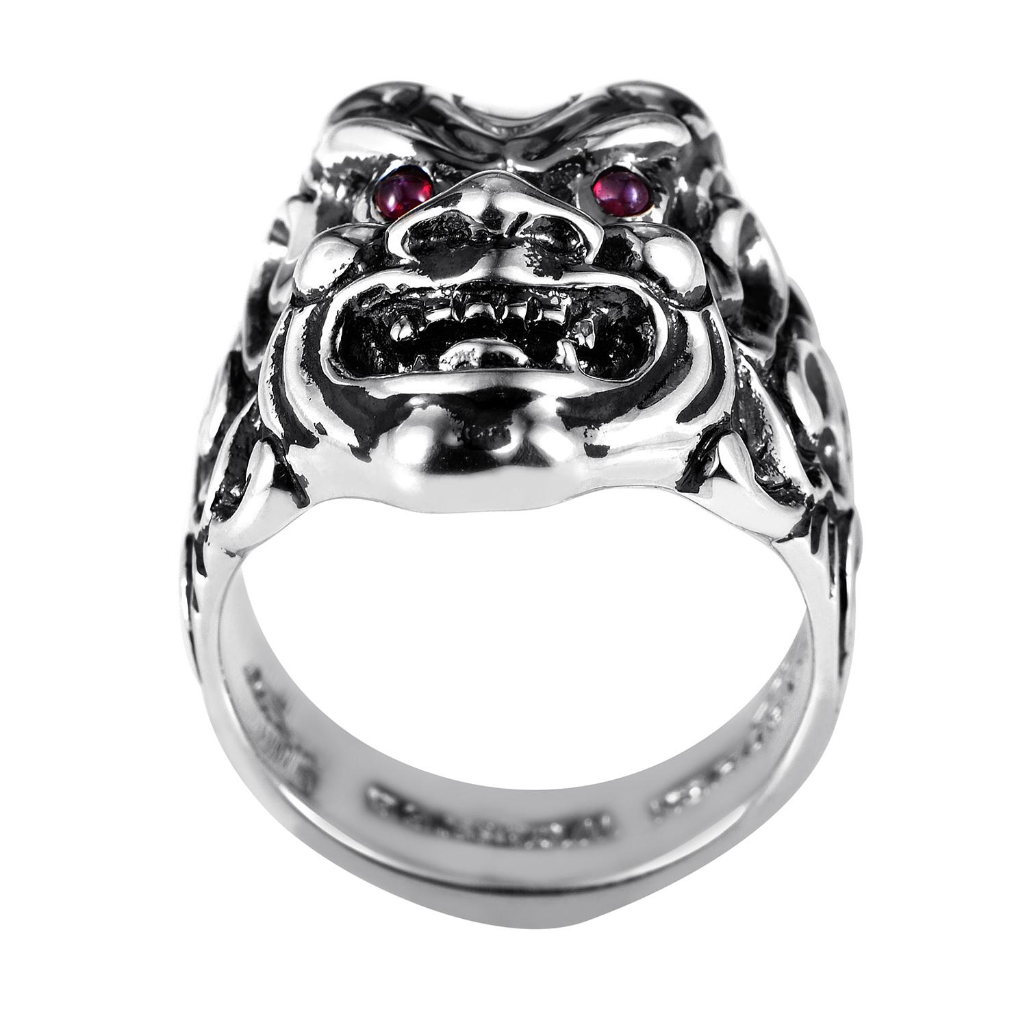 Classic becomes modern with this distinctly masculine men's ring by Stephen Webster. The bold Japanese warrior mask is made of finely crafted sterling silver with smoldering cabochon ruby eyes totaling 0.13ct for a somber but stylish finish.<br/>22