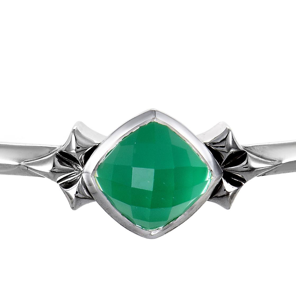 Bringing vivid color into an otherwise subtle design, Stephen Webster placed appealing synthesized chrysoprase stone along with quartz at the central spot of this marvelous white rhodium-plated silver bangle from the Superstud collection.