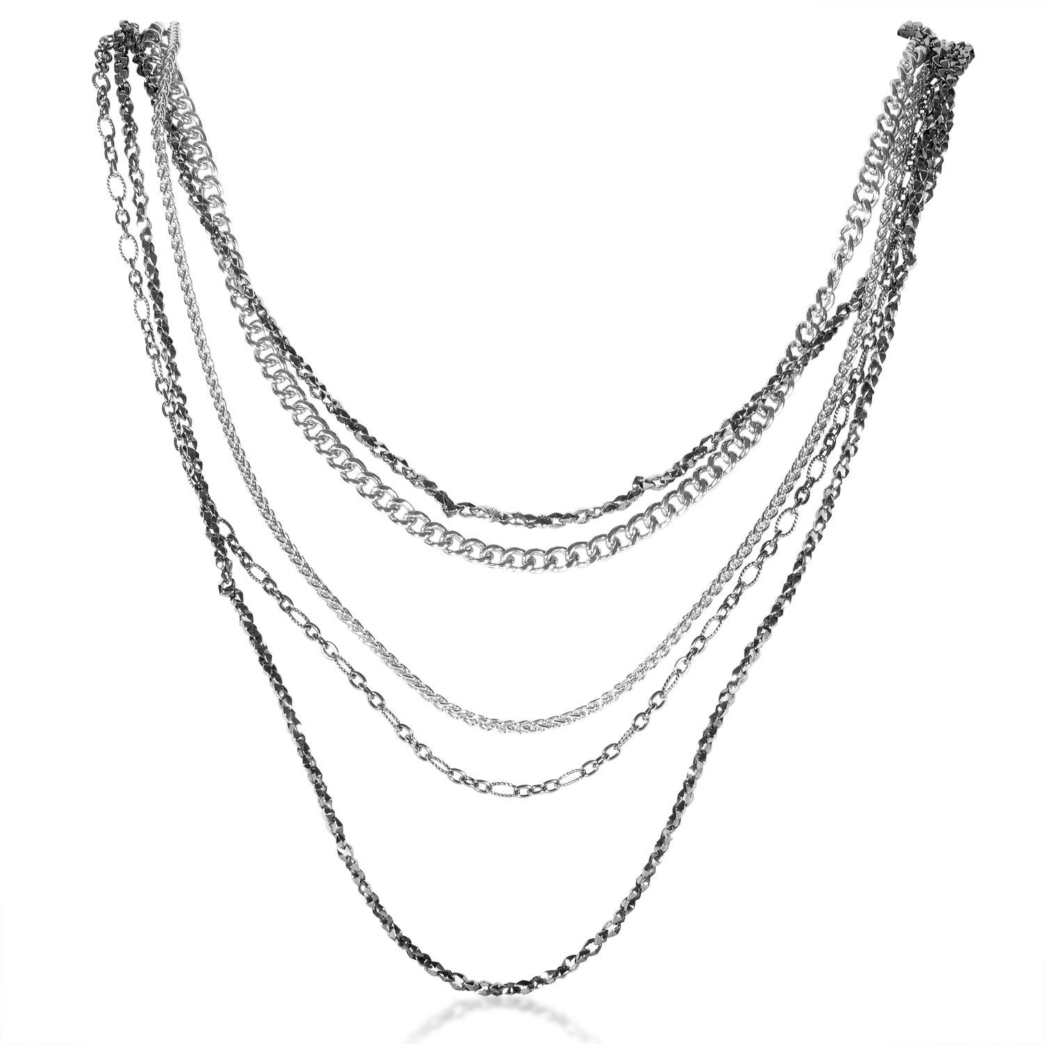 Multiple chains of diverse shape and thickness combine brilliantly in this exceptional silver necklace from Stephen Webster's Superstud collection to create an intriguing appearance, joined at the center with several rings which allure with their
