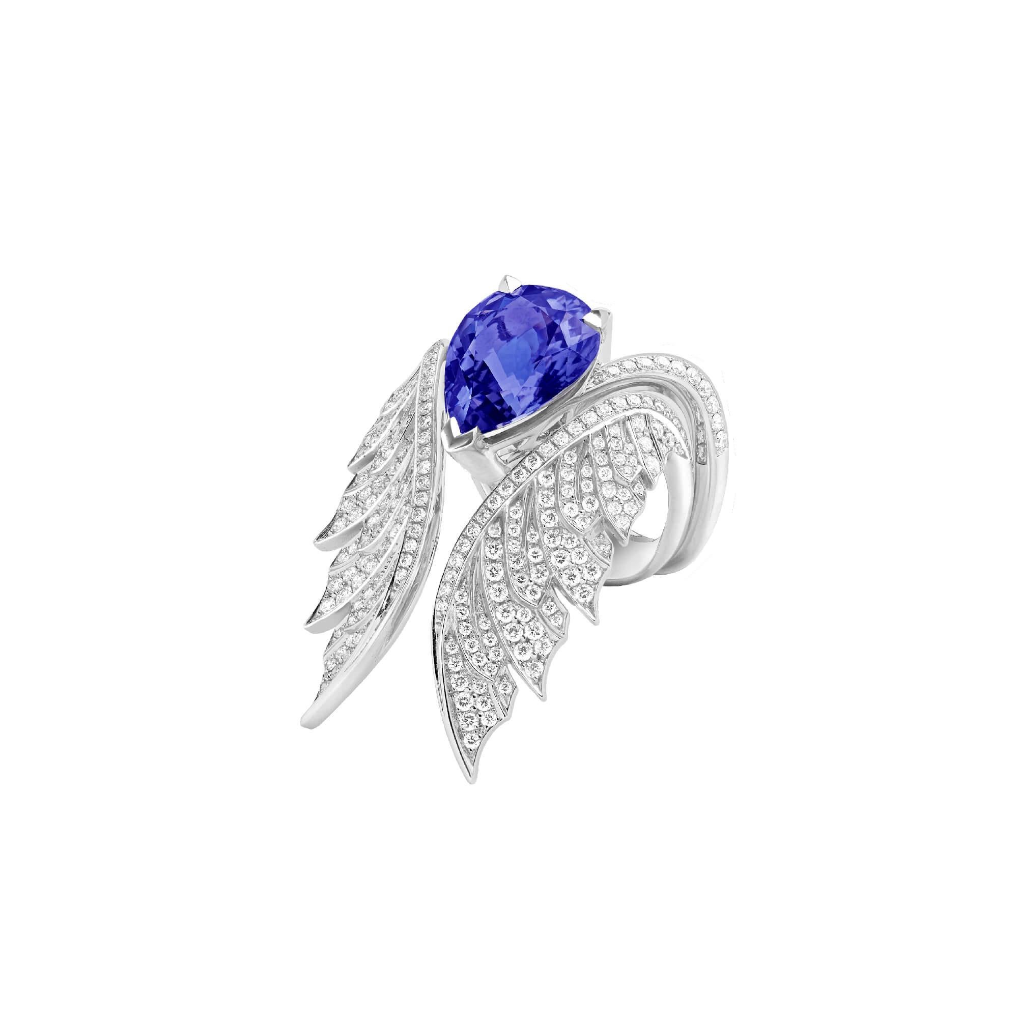 18ct white gold cocktail ring with white diamond pavé (0.18ct) and a centre pear-shaped tanzanite (4.93ct). The Pavé Cocktail Ring can be worn as an inner to the Magnipheasant Open Feather Ring, available in white gold.

Please enquire for available