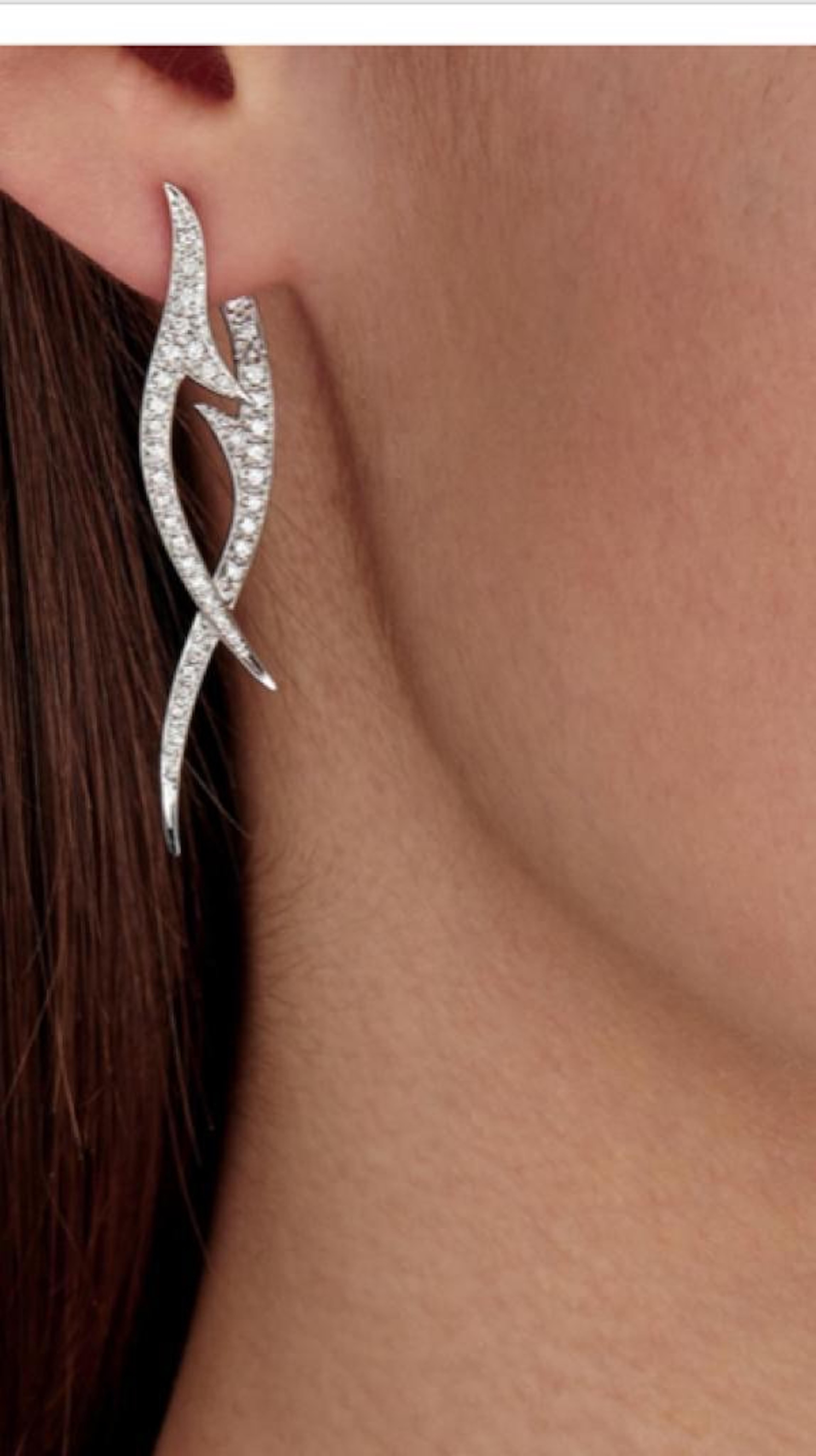 Iconic diamond earrings from the 'Thorn Noir' collection by British jewellery legend Stephen Webster. 18k white gold...