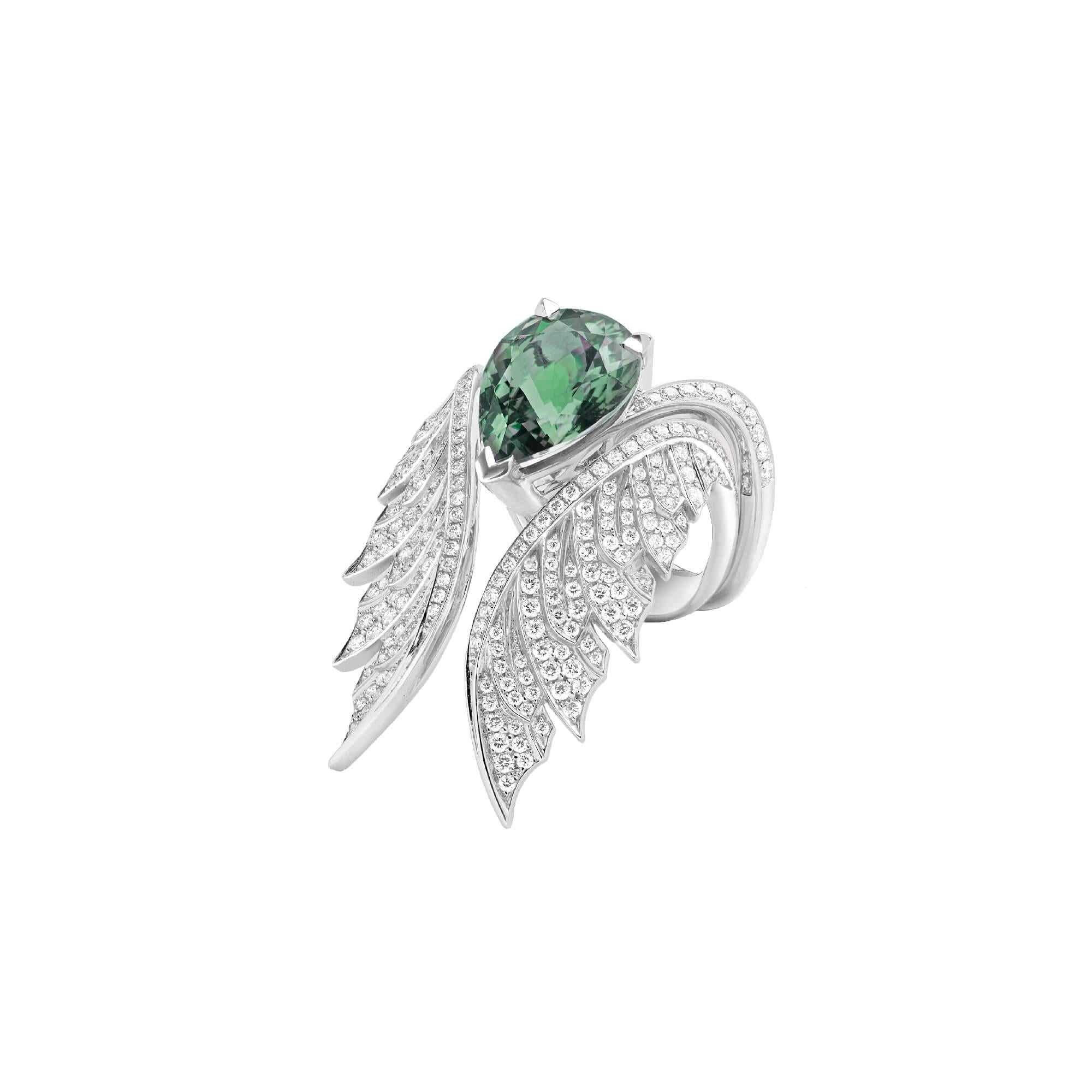 18ct white gold cocktail ring with white diamond pavé (0.19ct) and a centre pear-shaped green tourmaline (3.65ct). The Pavé Cocktail Ring can be worn as an inner to the Magnipheasant Open Feather Ring, available in white gold.

Please enquire for