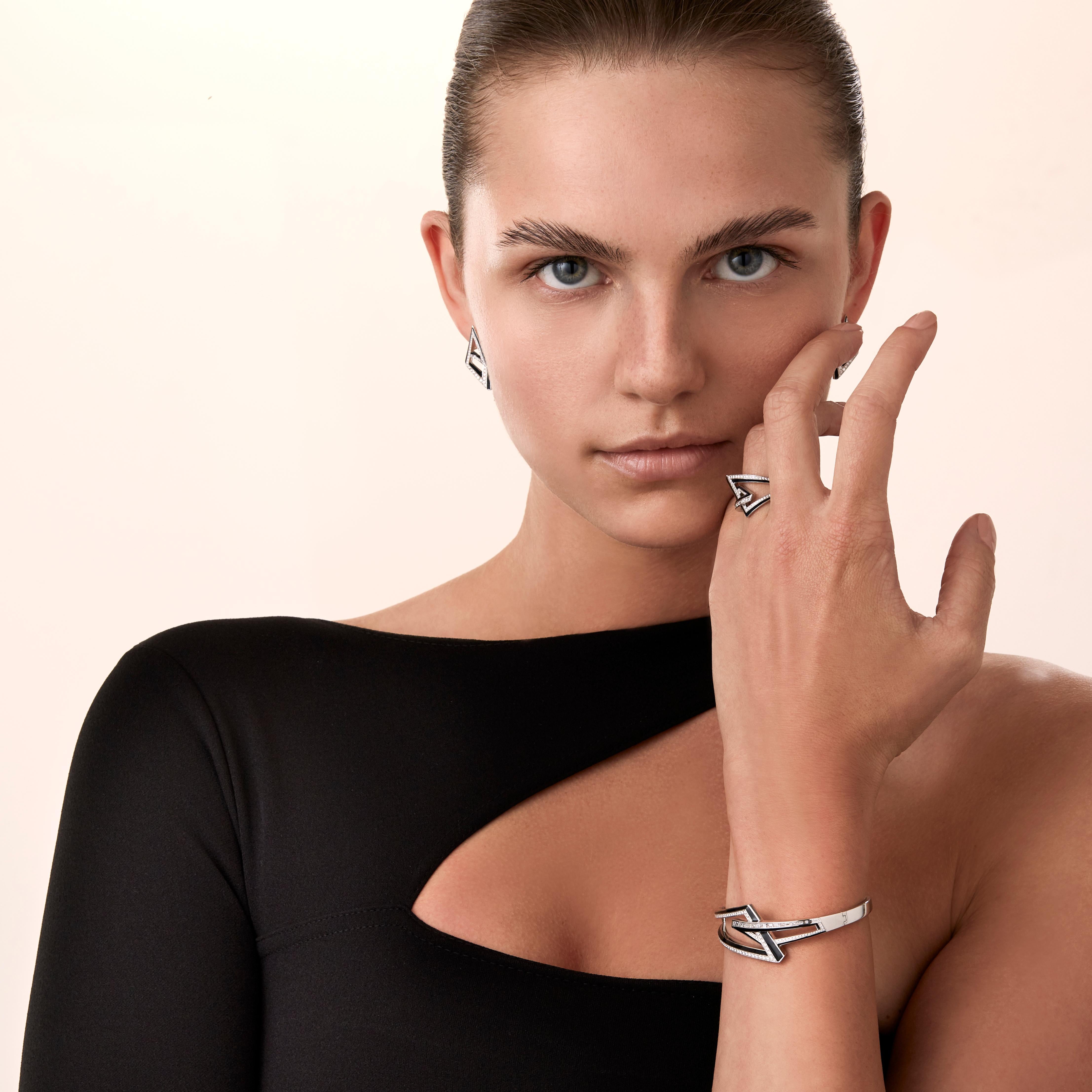 Modern and intriguing, Vertigo combines technology with tradition with mixed media materials of titanium and ceramic enamel, precious metals, diamonds and exotic baguette cut spinels. Vertigo is a collection of strong angular lines, bold colour and