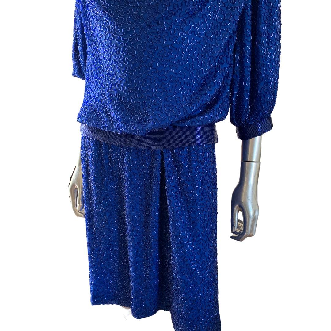 Another glamorous custom made plus size evening dress by New York designer, Stephen Yearick. This gorgeous royal blue color dress was completely beaded by hand with bugle beads. Lined in royal blue silk. Retailed for $2900. Size tag removed it is a