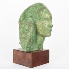 Kopf einer Frau, grün patinierter Zementkopf von Erzia