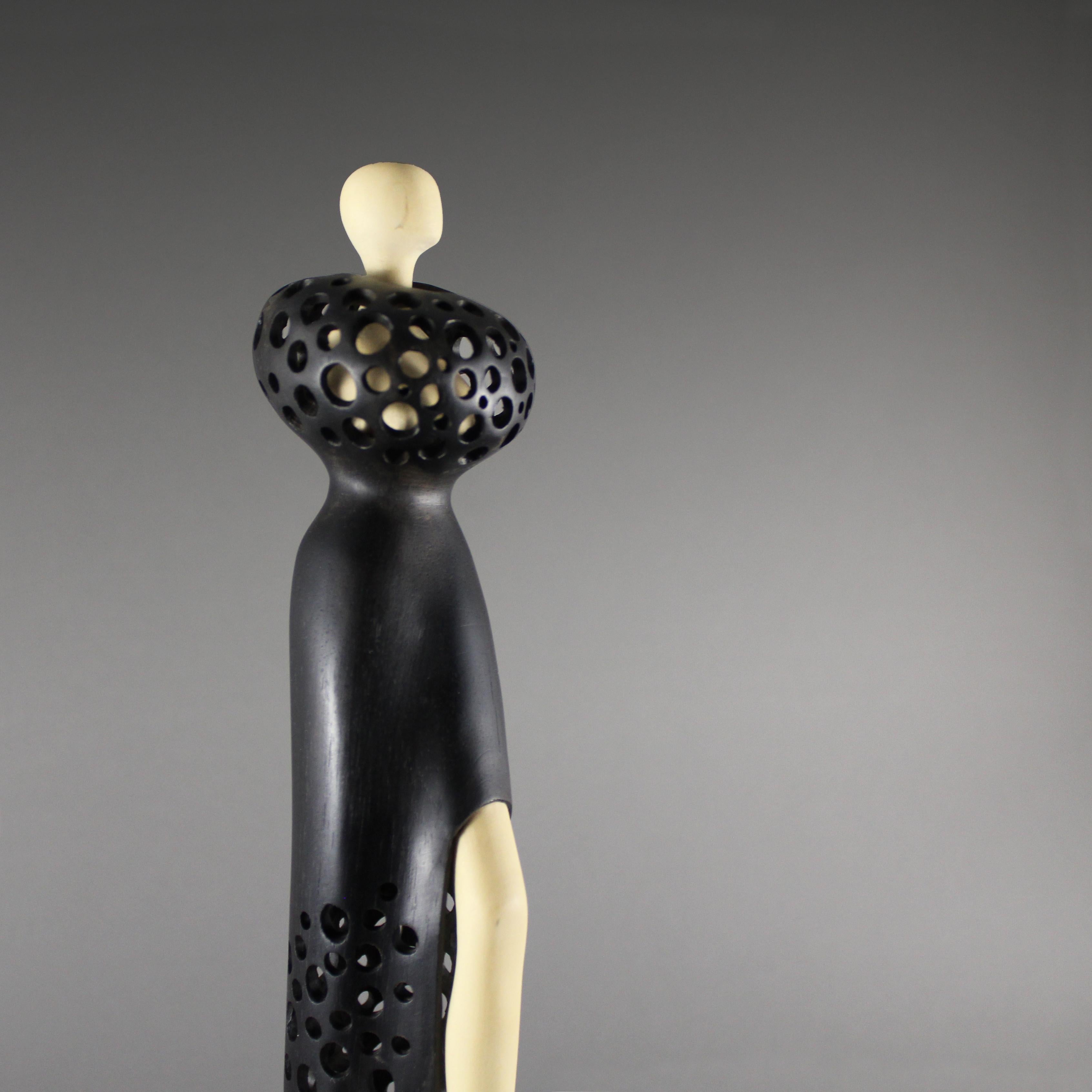 American Stepping Out, Ebony and Holly wood sculpture by Nairi Safaryan For Sale