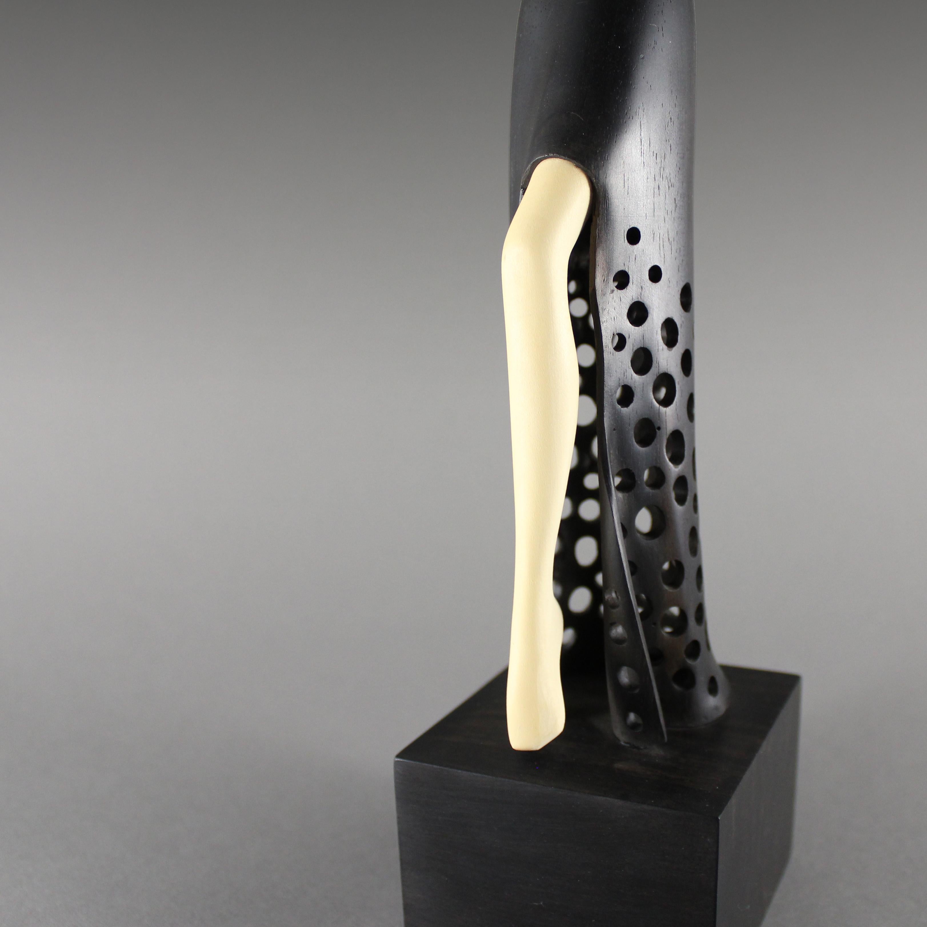 Turned Stepping Out, Ebony and Holly wood sculpture by Nairi Safaryan For Sale