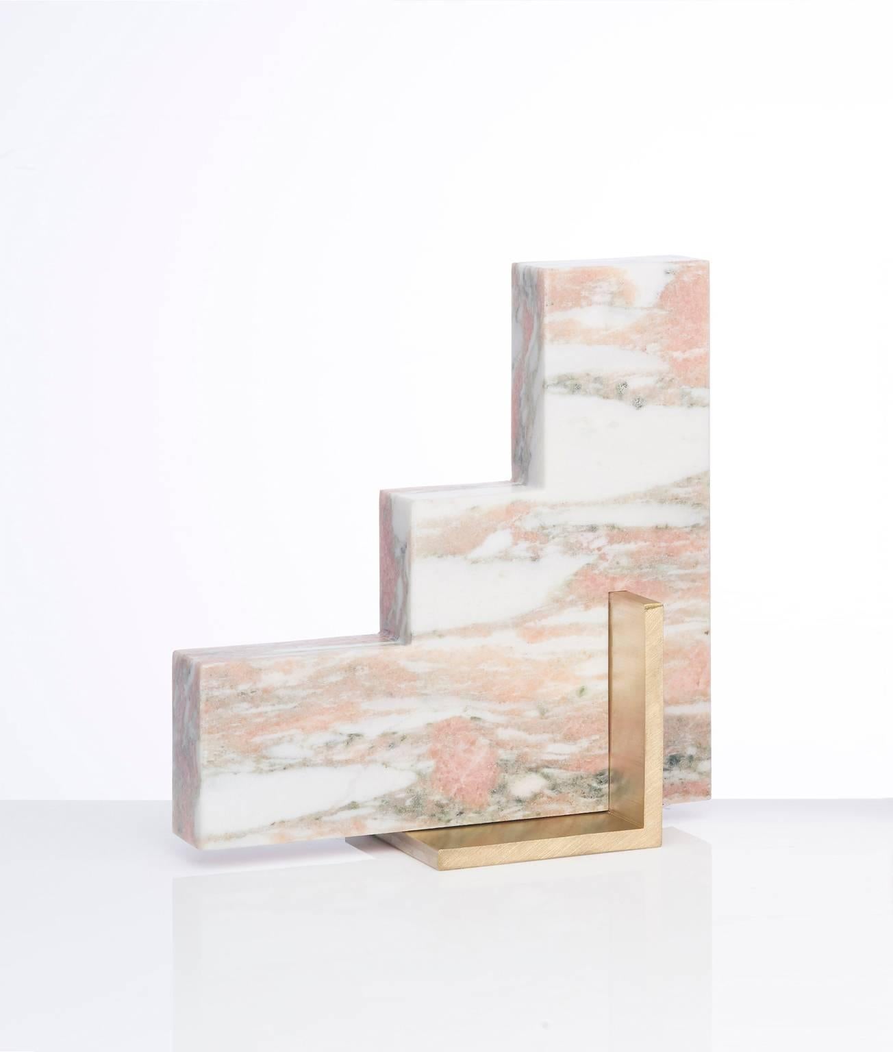 Meet Steppy; one half of the odd couple bookends set which are now available to buy individually. You can now mix and match colors and shapes.
Steppy is shown here in Norwegian Rose marble and a brushed brass base.
The marble is cut into a geometric